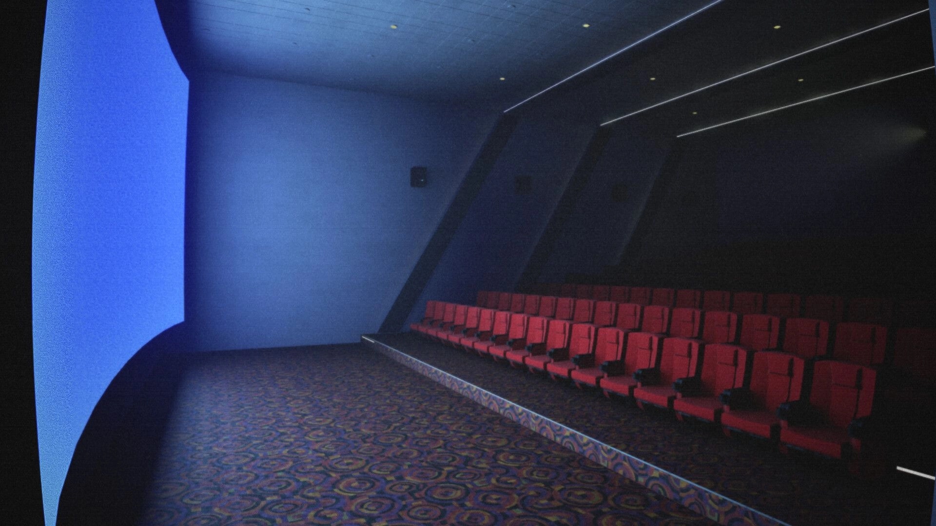 Late Shift: First-person view of empty cinema seats and glowing screen in a dim theater auditorium.