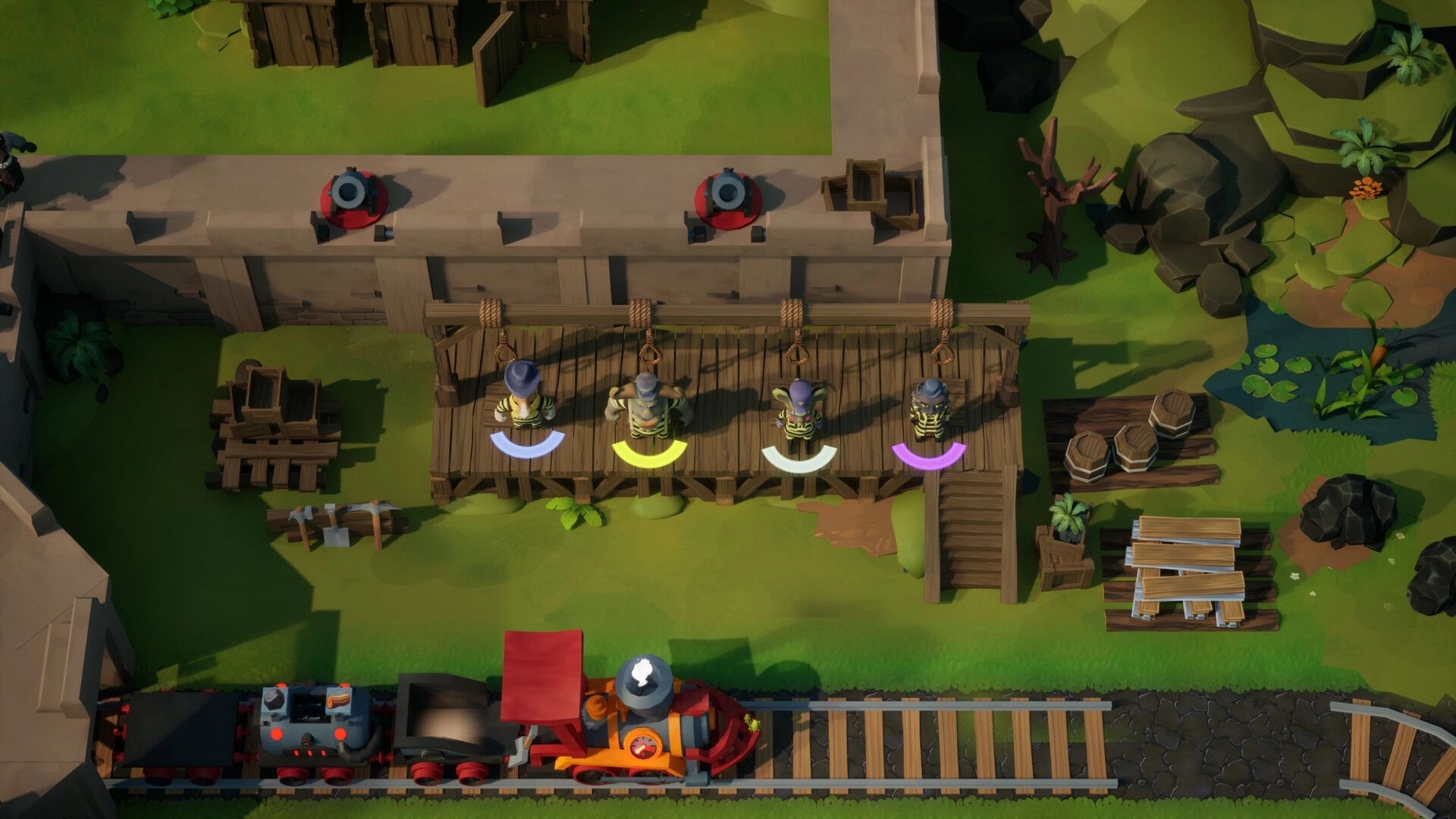 Loco: Four players hang from ropes on a wooden bridge above tracks, train passing below by pond.