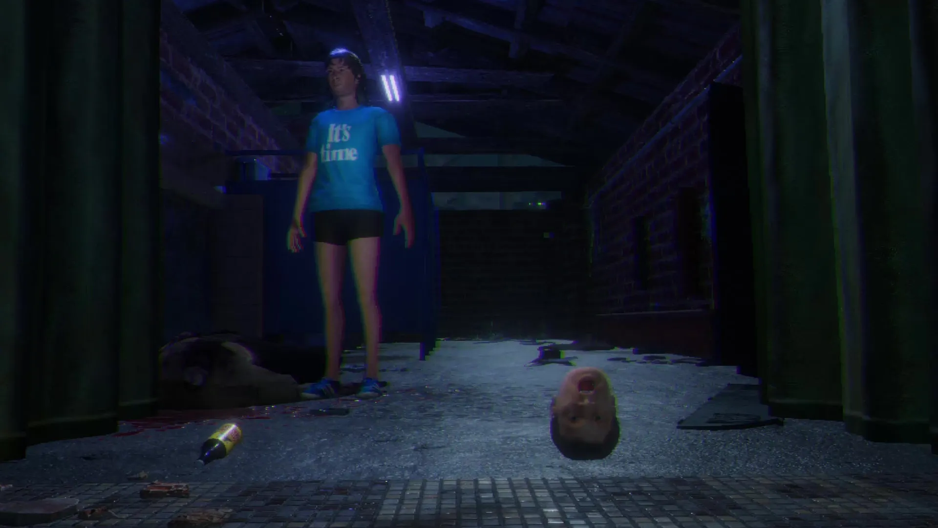 Loggerhead: Character in blue shirt stands in dark brick hallway with debris and severed head on floor