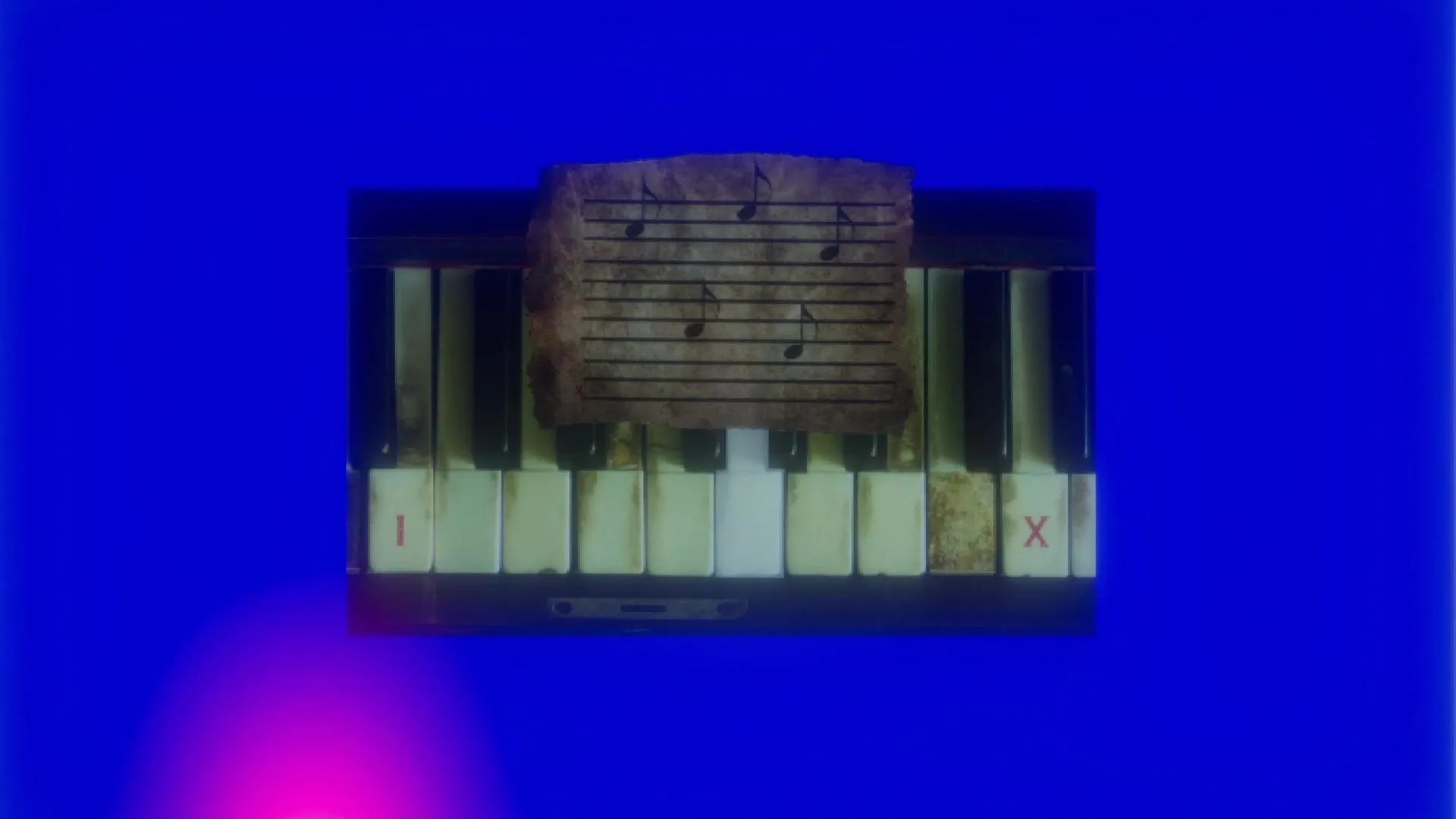 Loggerhead: Puzzle with sheet music on old piano keys in eerie blue-lit room