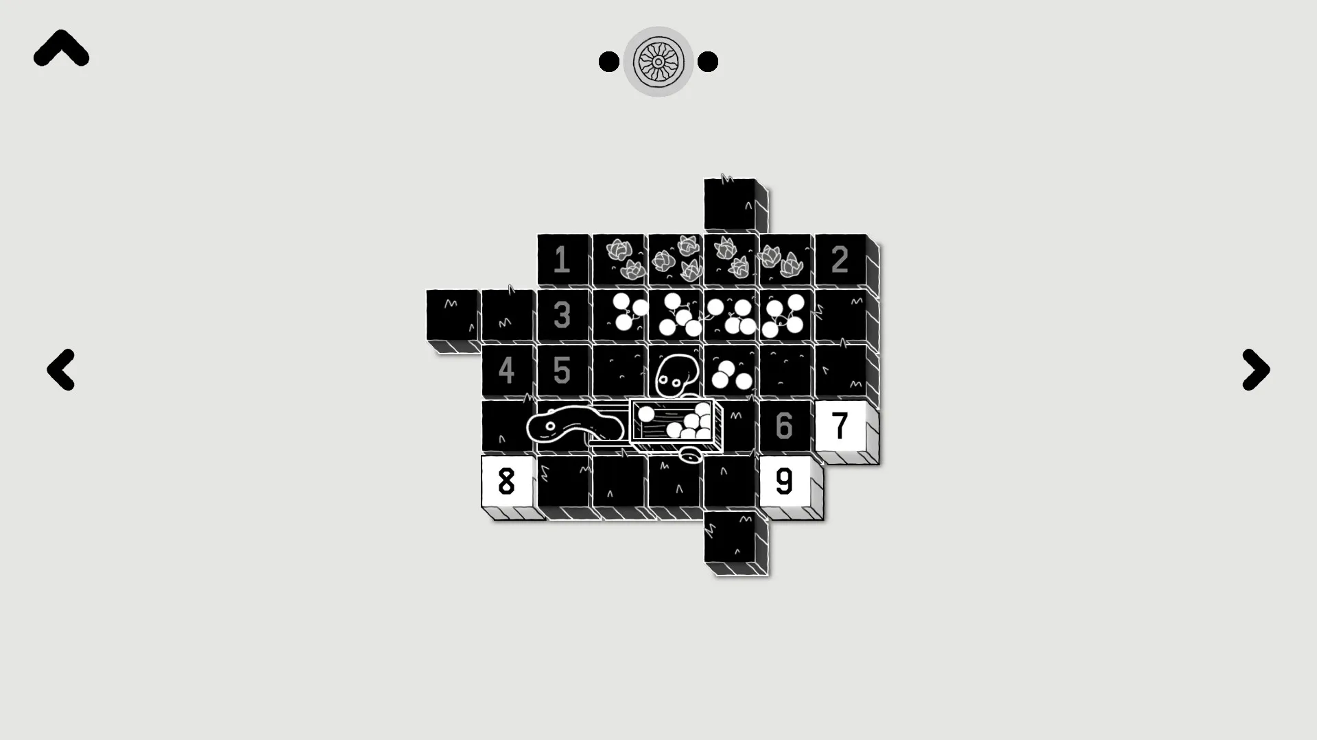 LOK Digital: Puzzle grid with numbered blocks and LOK creature interacting in monochrome environment