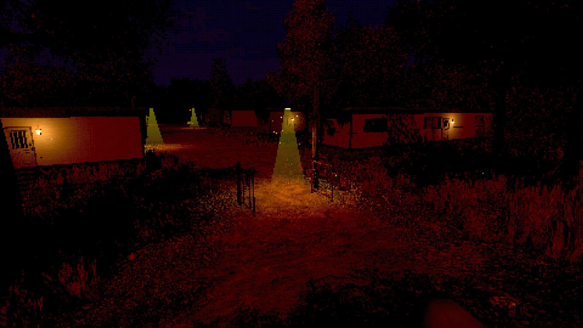 Loveland: First-person view down a dirt path between lit trailers at night in a rural park.
