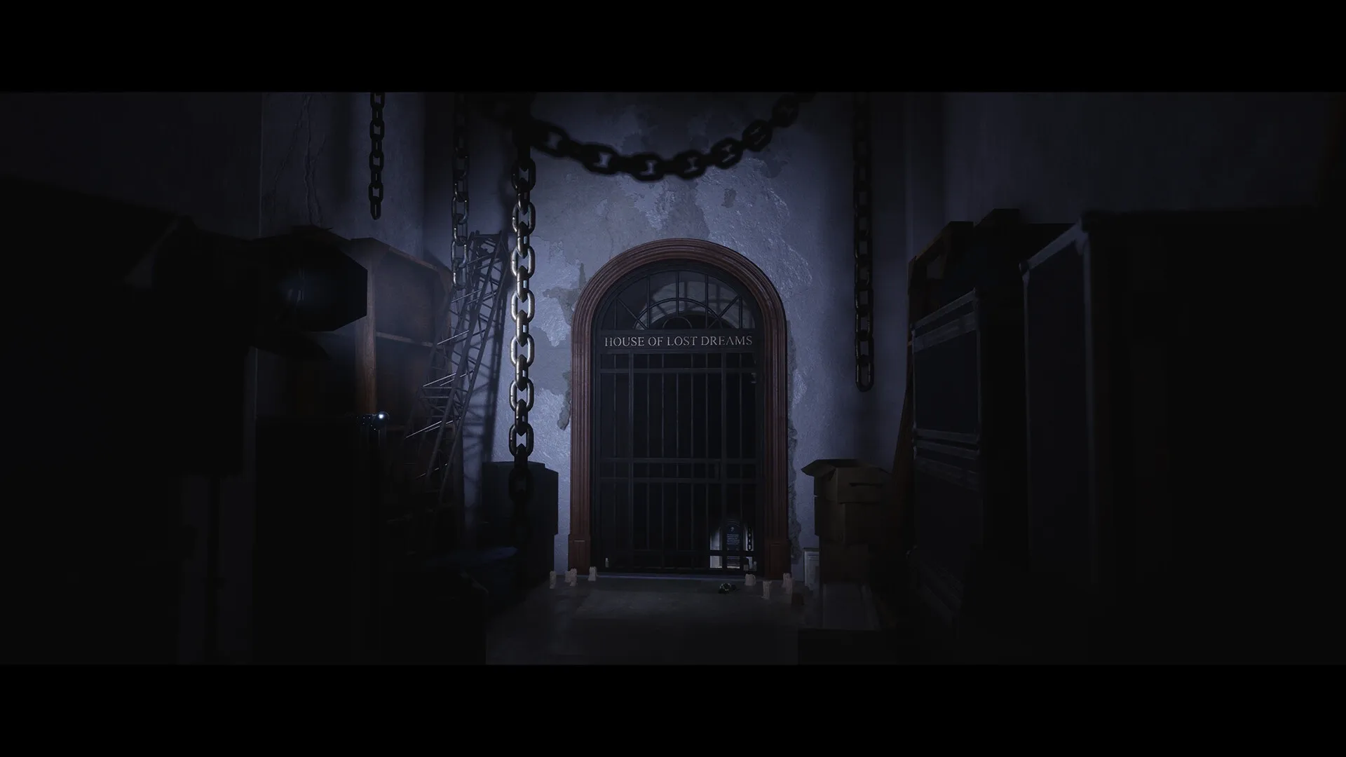 Luto: Dimly lit corridor with chains and "House of Lost Dreams" door, surrounded by boxes and equipment.