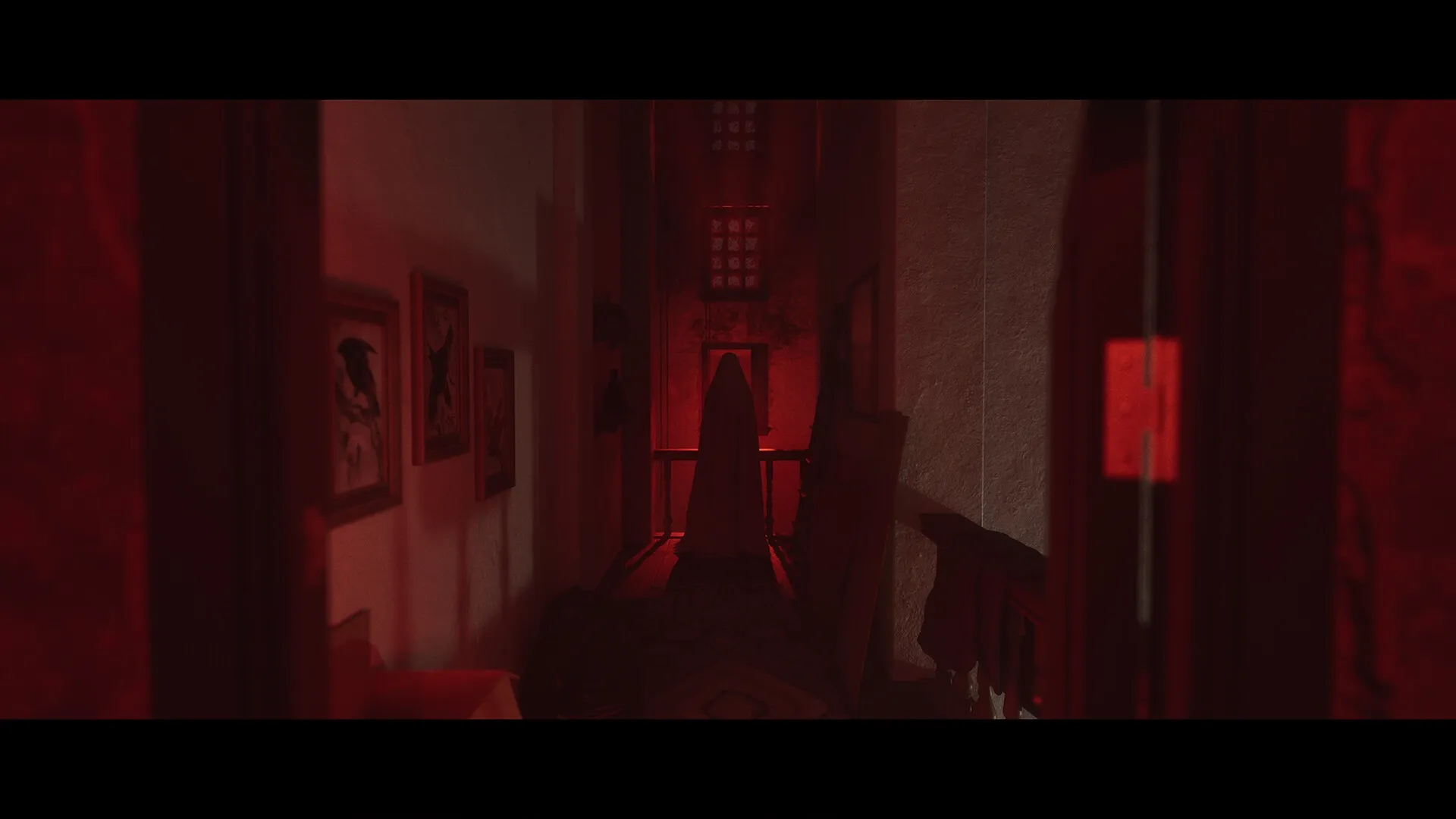 Luto: Shadowy figure in dimly lit hallway with red lighting and framed pictures on the walls