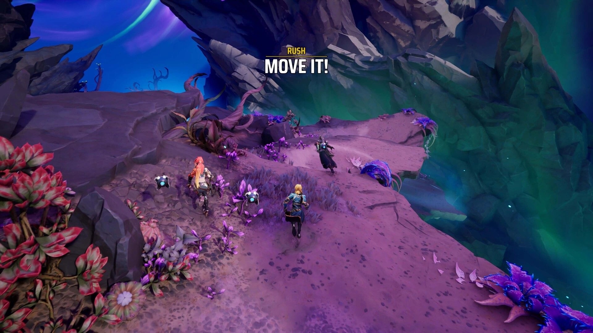 Marked For Mayhem: Three players sprint as “RUSH MOVE IT!” appears on an alien cliff path at dusk.