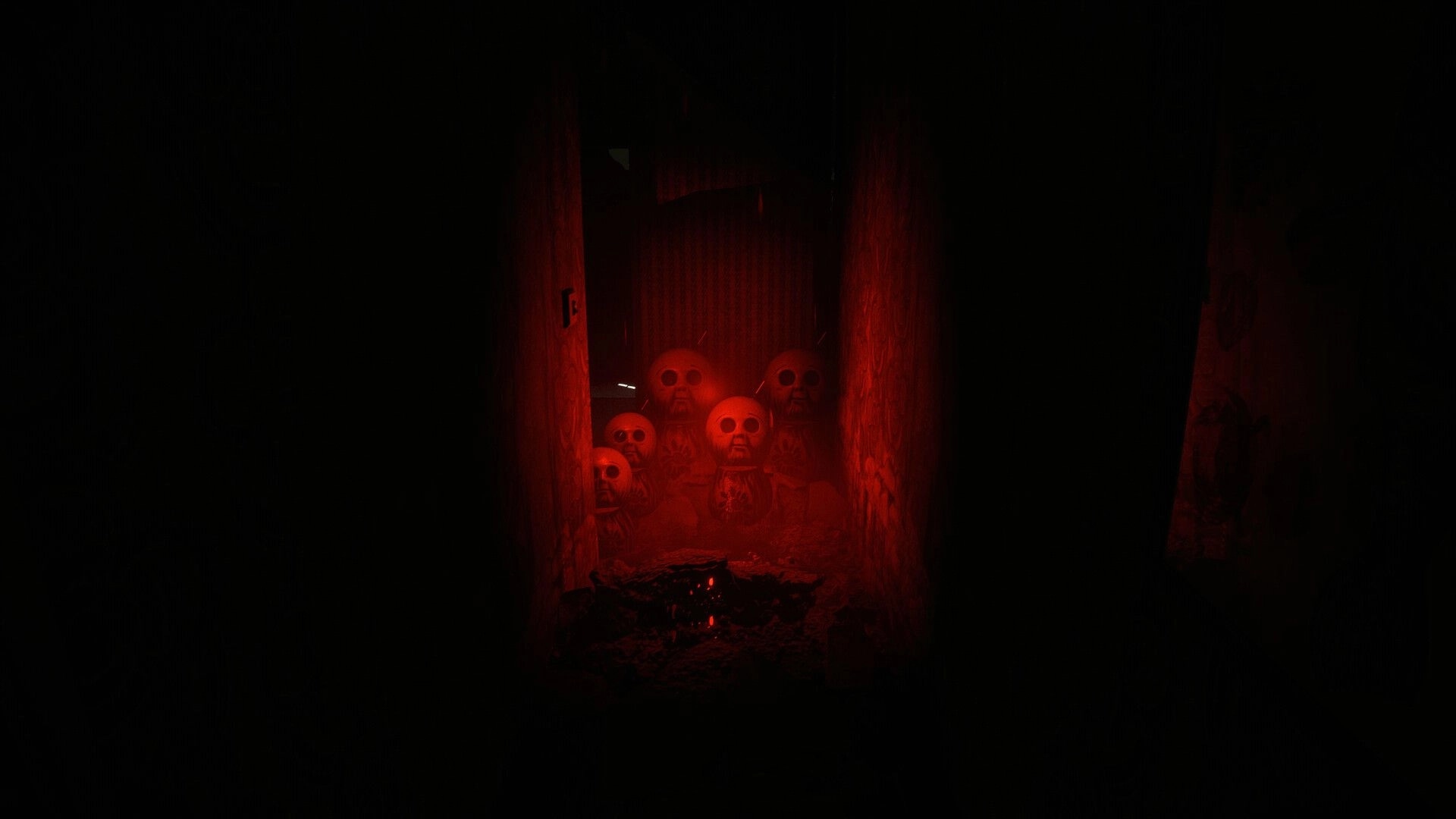 MATRESHKA: Red-lit corridor with eerie matryoshka dolls and debris in an abandoned Soviet building