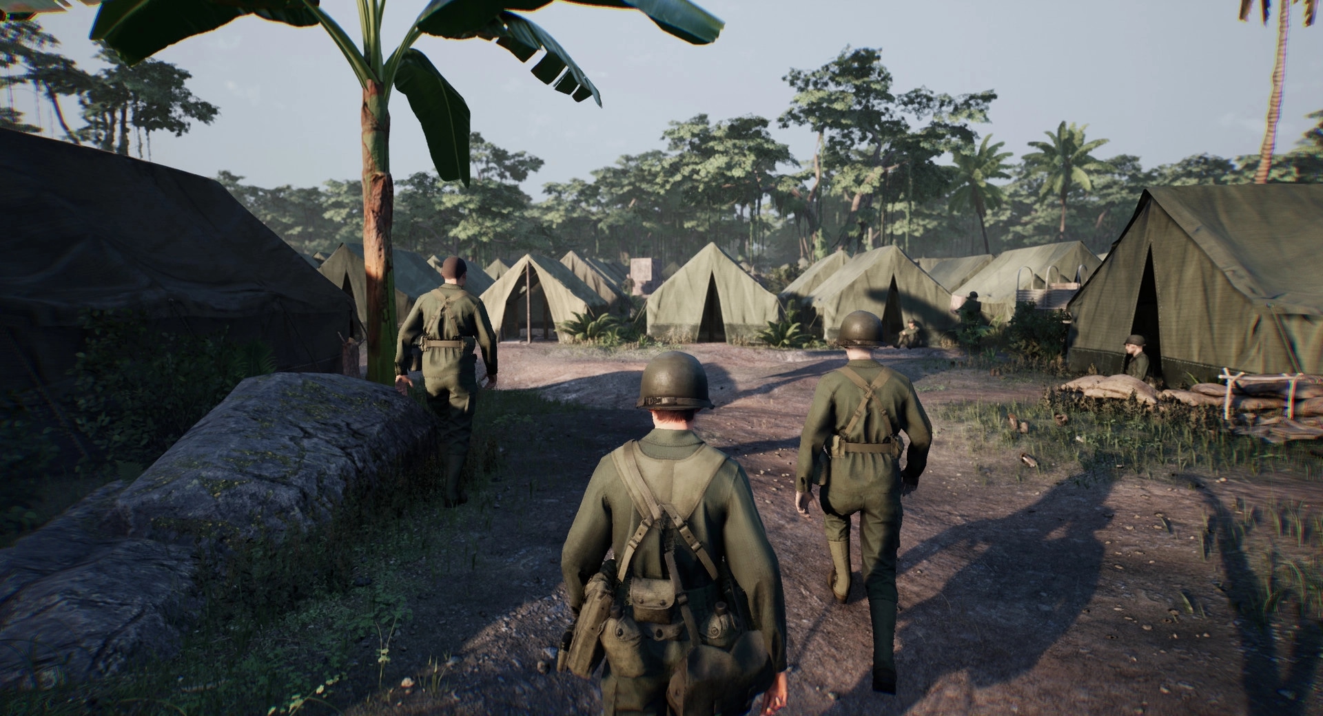 Medic: Soldiers walking through a tented camp surrounded by jungle foliage on the Pacific Front.