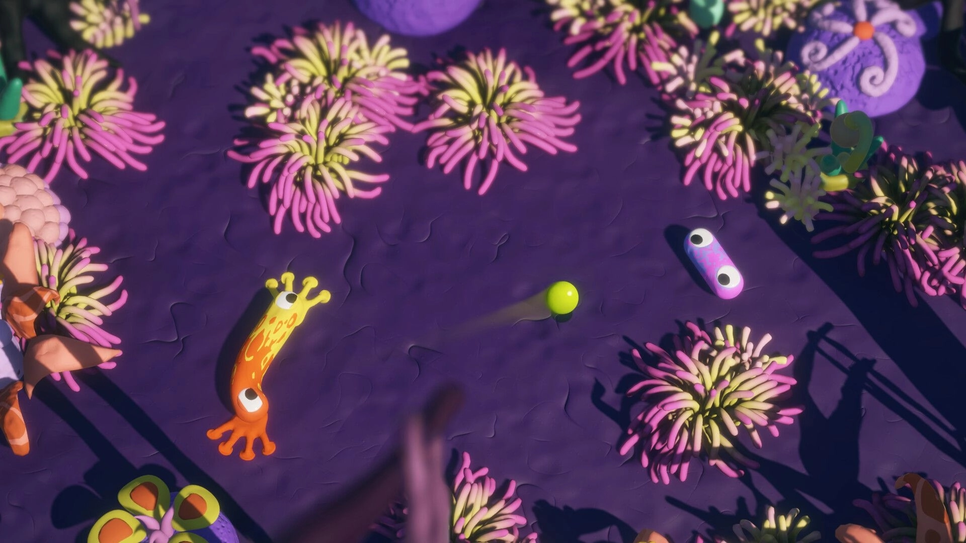 Mewts: Colorful slugs dodge bouncing ball in vibrant arena with pink and green anemone-like plants