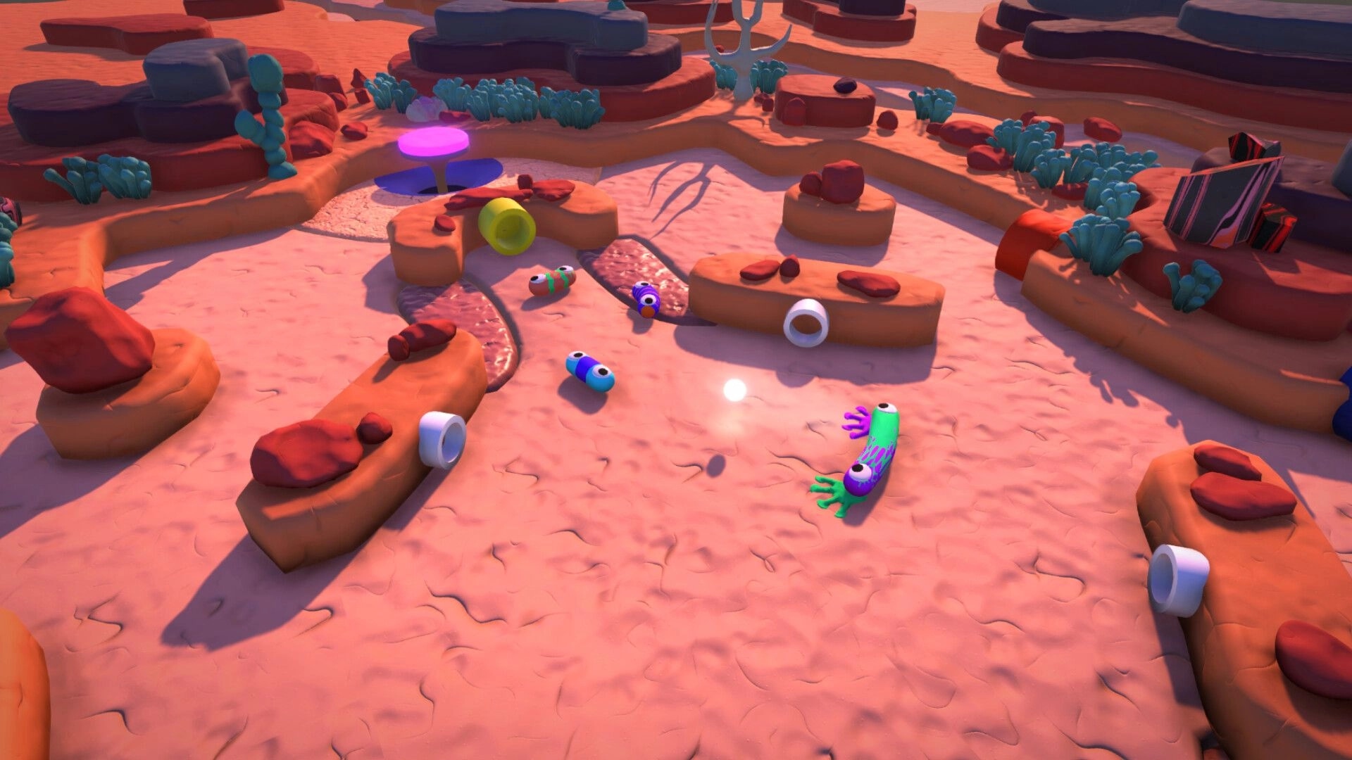 Mewts: Colorful creatures battling in a vibrant desert arena with rocky terrain and glowing plants.