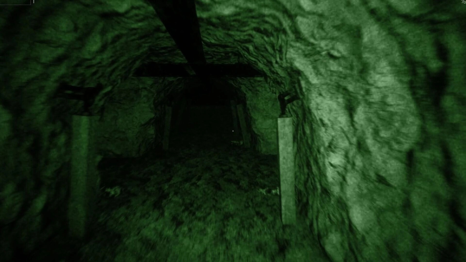Midnight Crane: Night vision view of a dimly lit tunnel with rocky walls and wooden beams