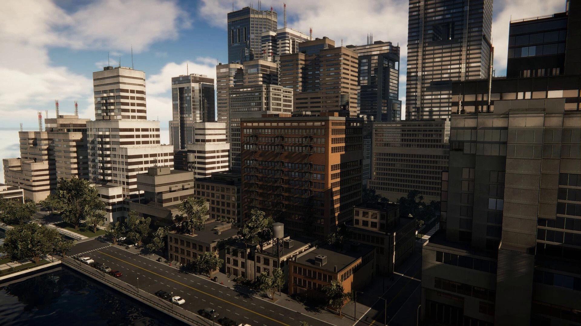 miniopolis: Dense downtown skyscrapers and midrise blocks beside a waterfront road under cloudy sky.