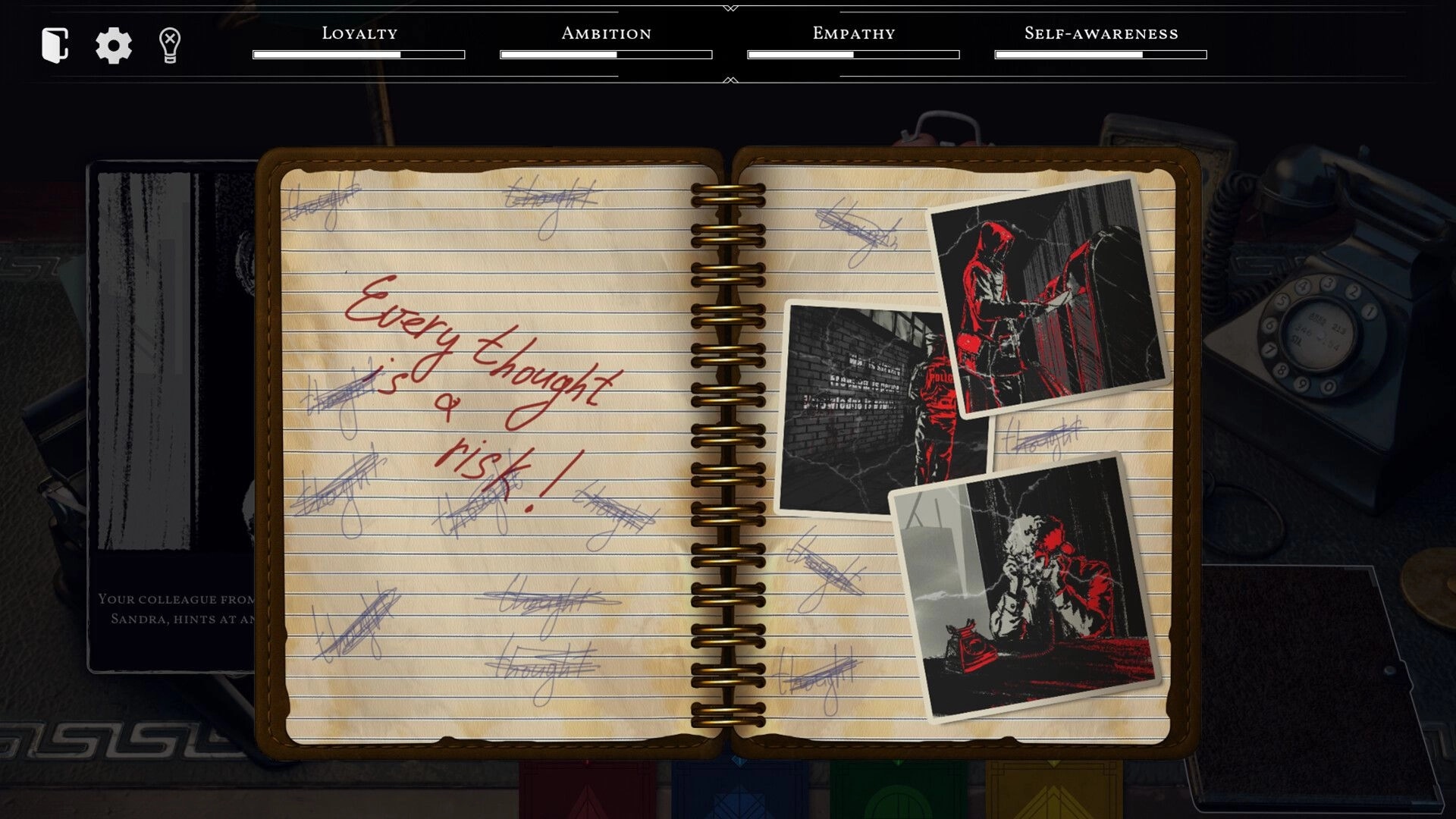 MINISTRY OF TRUTH: Open notebook on desk with photos and text "Every thought is a risk!" in office setting