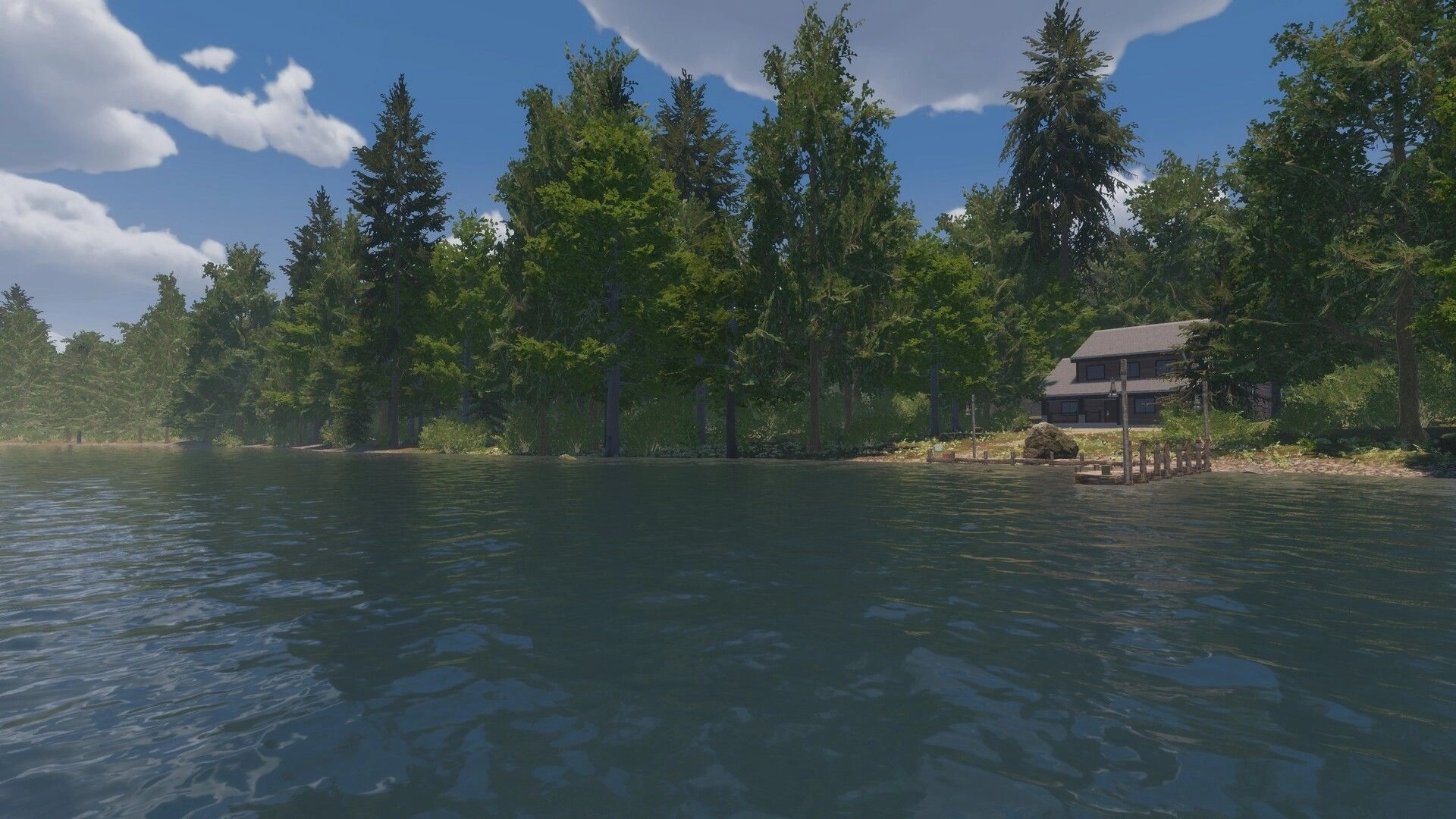 MLF: Calm lake view facing a wooded shoreline with a cabin and small dock under a bright sky.