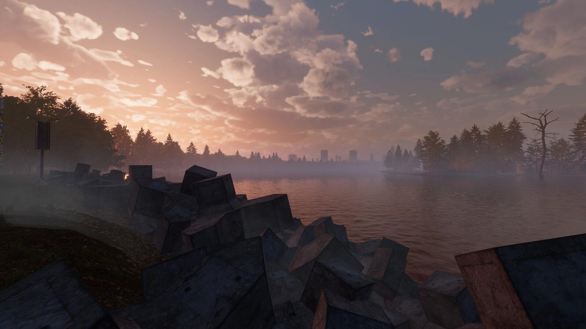 MLF: Scenic lakeshore view with rock breakwater at sunset, misty water and distant city skyline.