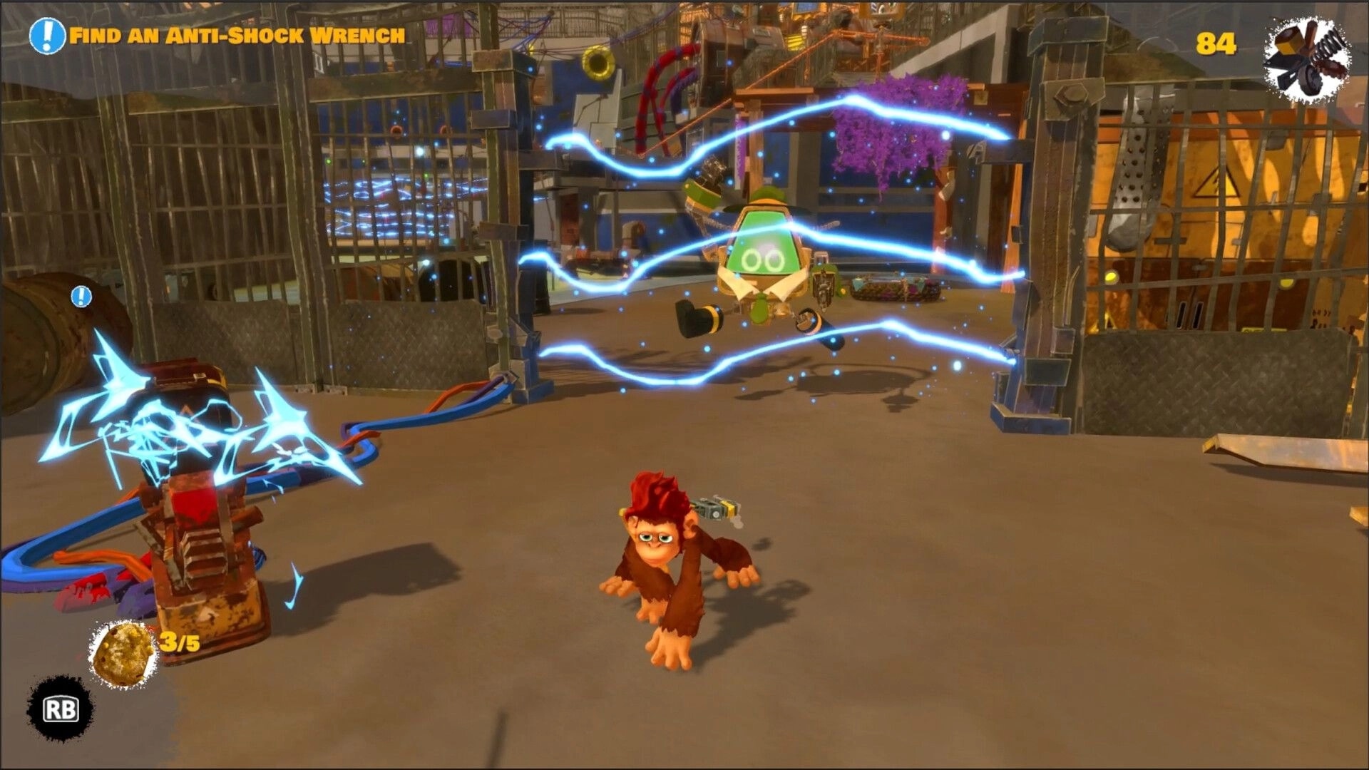 Monkey Do!: Mak sneaks past a crackling electric barrier in a metal zoo corridor, objective UI up.