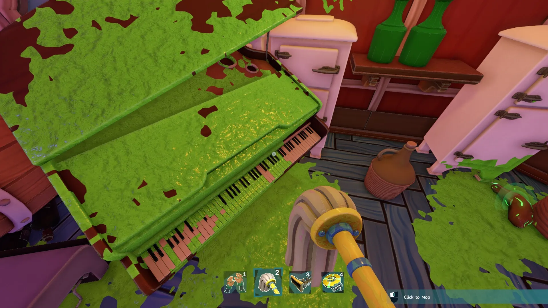 Monster Mop Up: Cleaning green slime from piano in cluttered room with mop and tools menu visible