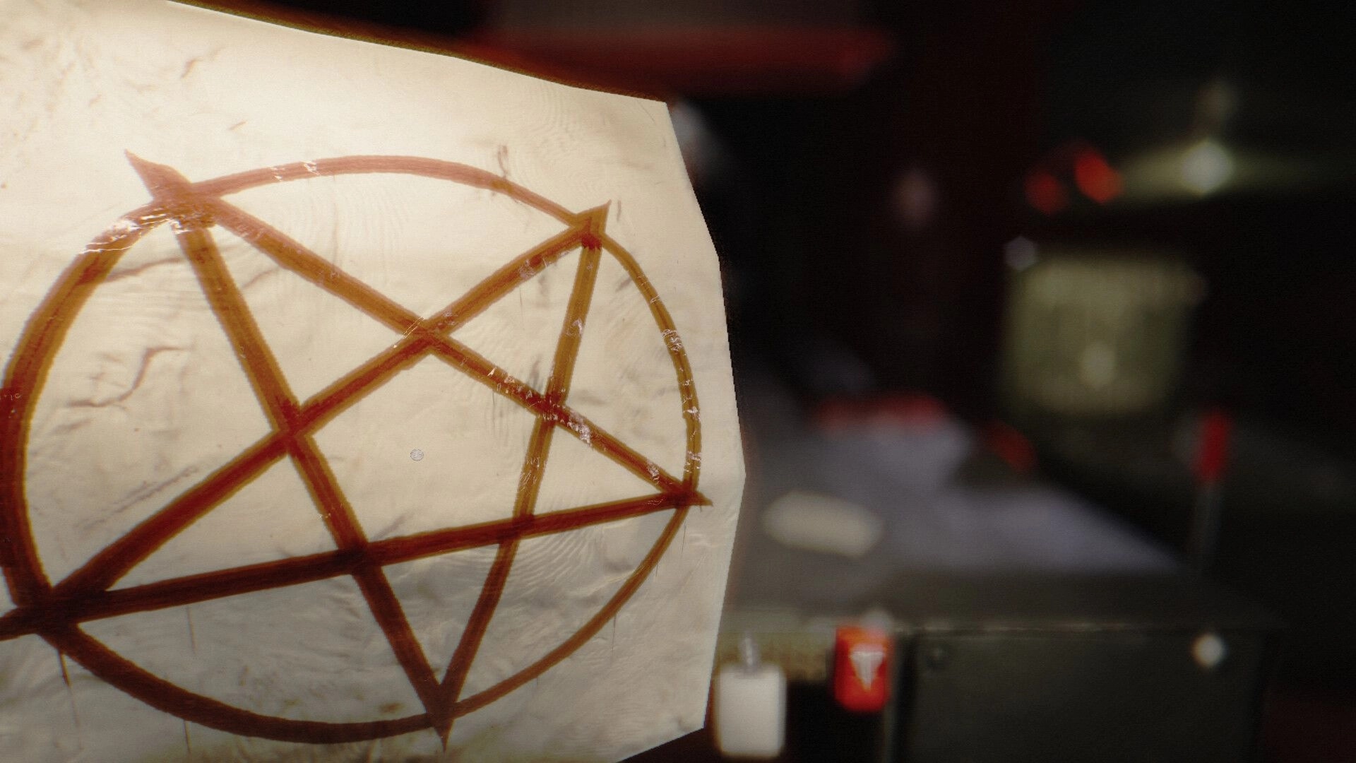Morbid Mailroom: Close-up of a pentagram stamp on paper, blurred mailroom desk and shelves behind.