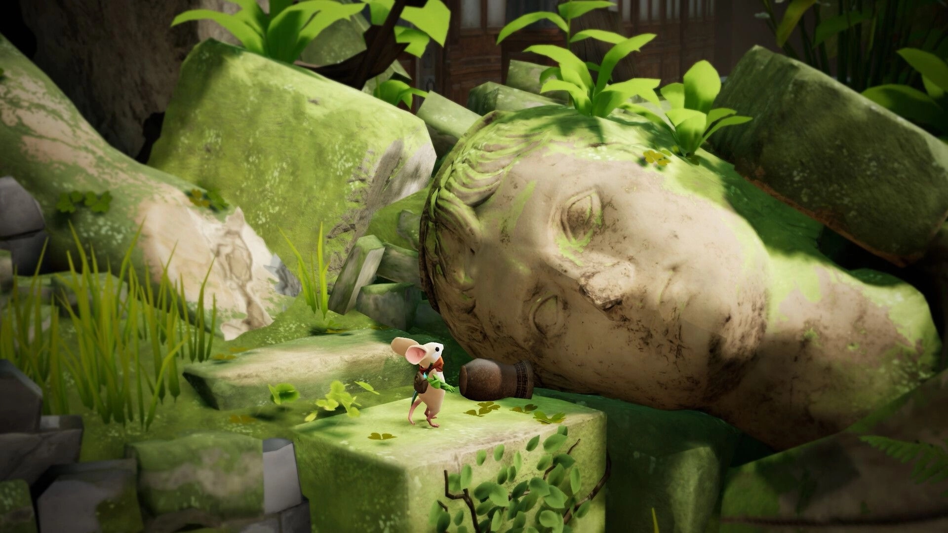 Moss: Quill stands on a mossy stone ledge beside a toppled statue head in overgrown ruins.