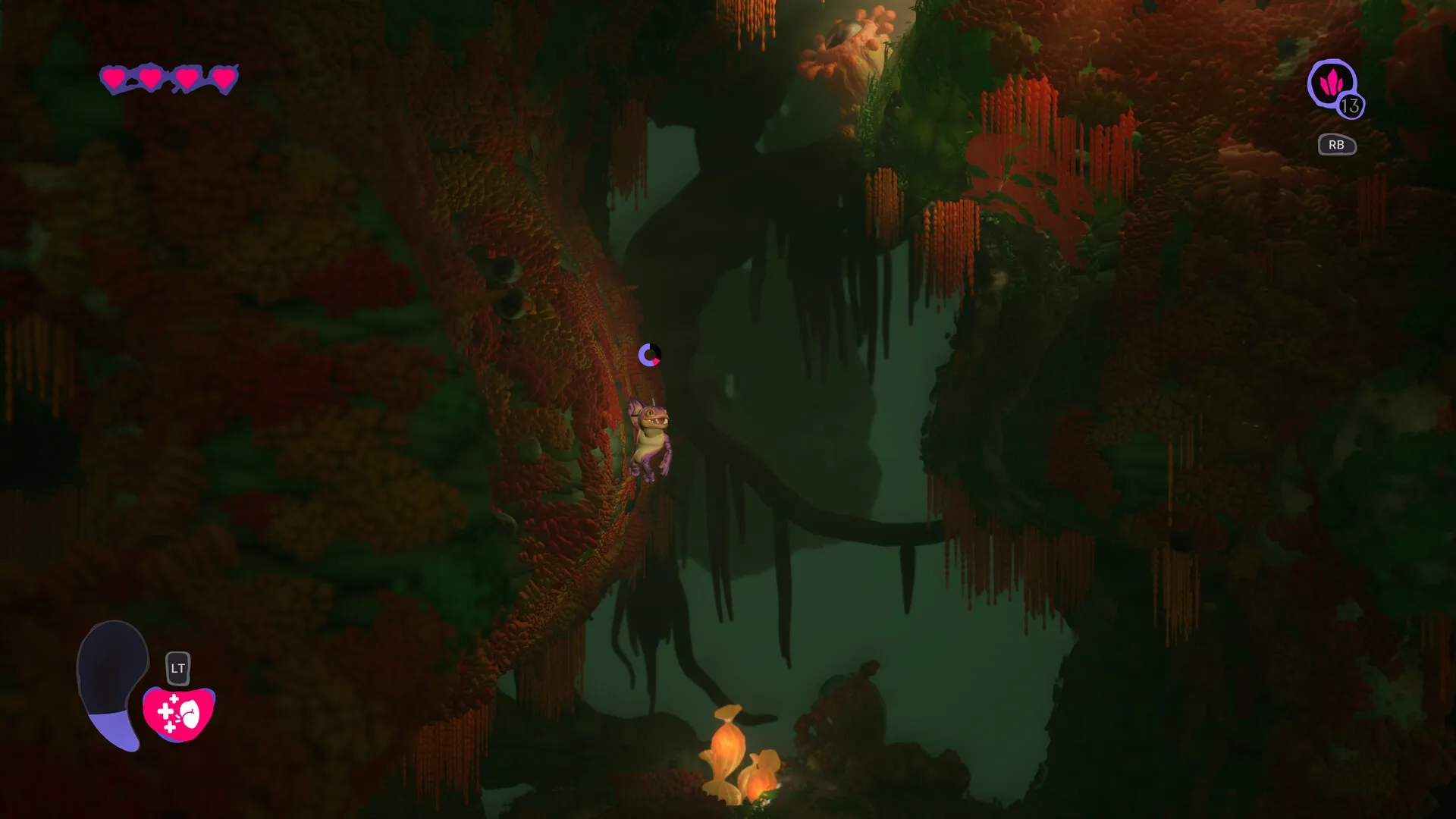 Mother Machine: Character clings to vibrant cave wall with glowing plants and heart icons displayed