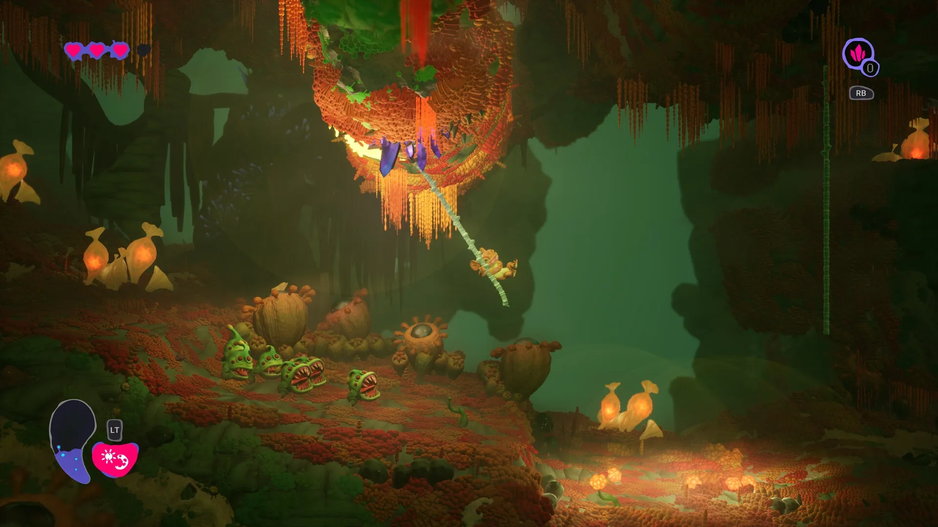 Mother Machine: Character swings on a vine in glowing alien cave with heart and crystal UI elements visible.