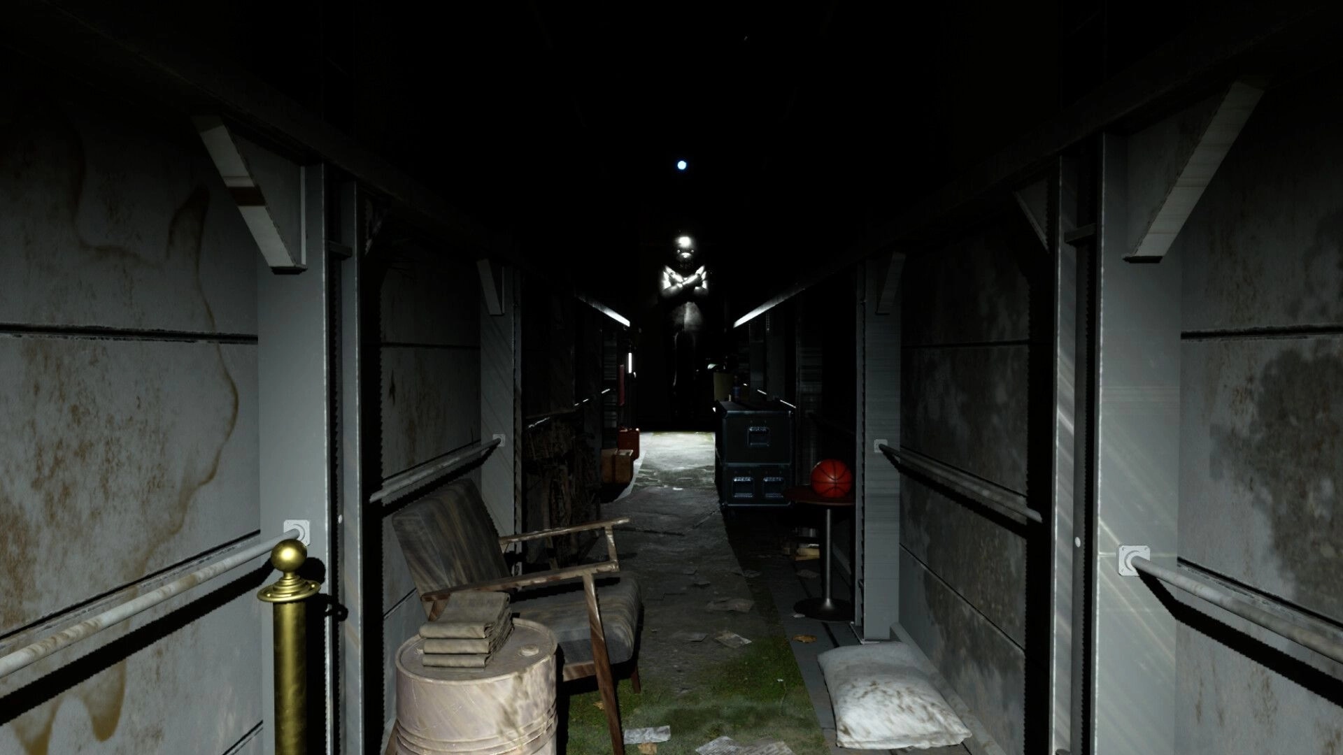 Mr Wonder: Dark corridor with a mysterious glowing figure at the end, surrounded by clutter and debris.