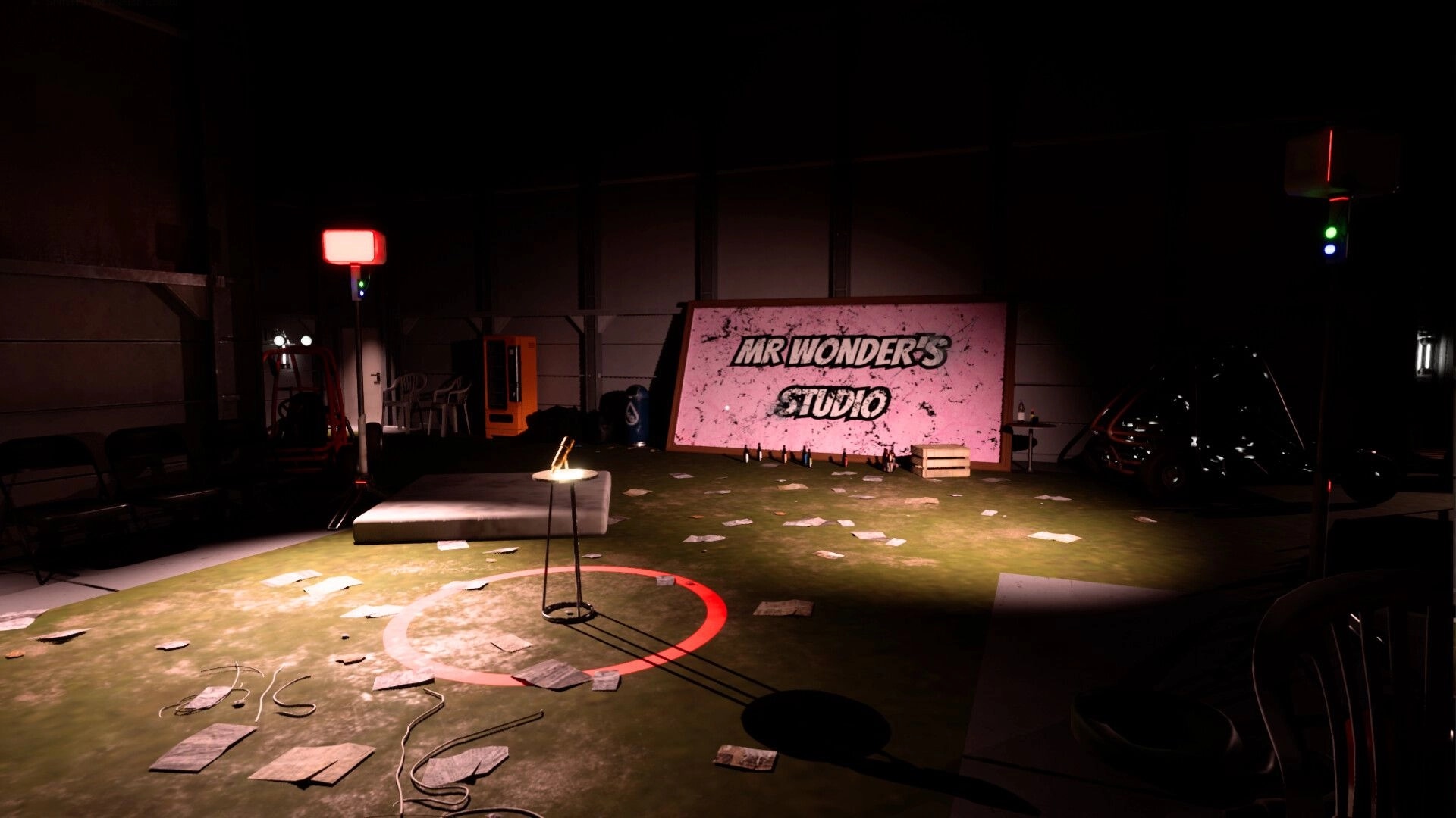 Mr Wonder: Dimly lit studio with scattered papers, red lights, and a large sign reading "Mr Wonder's Studio"