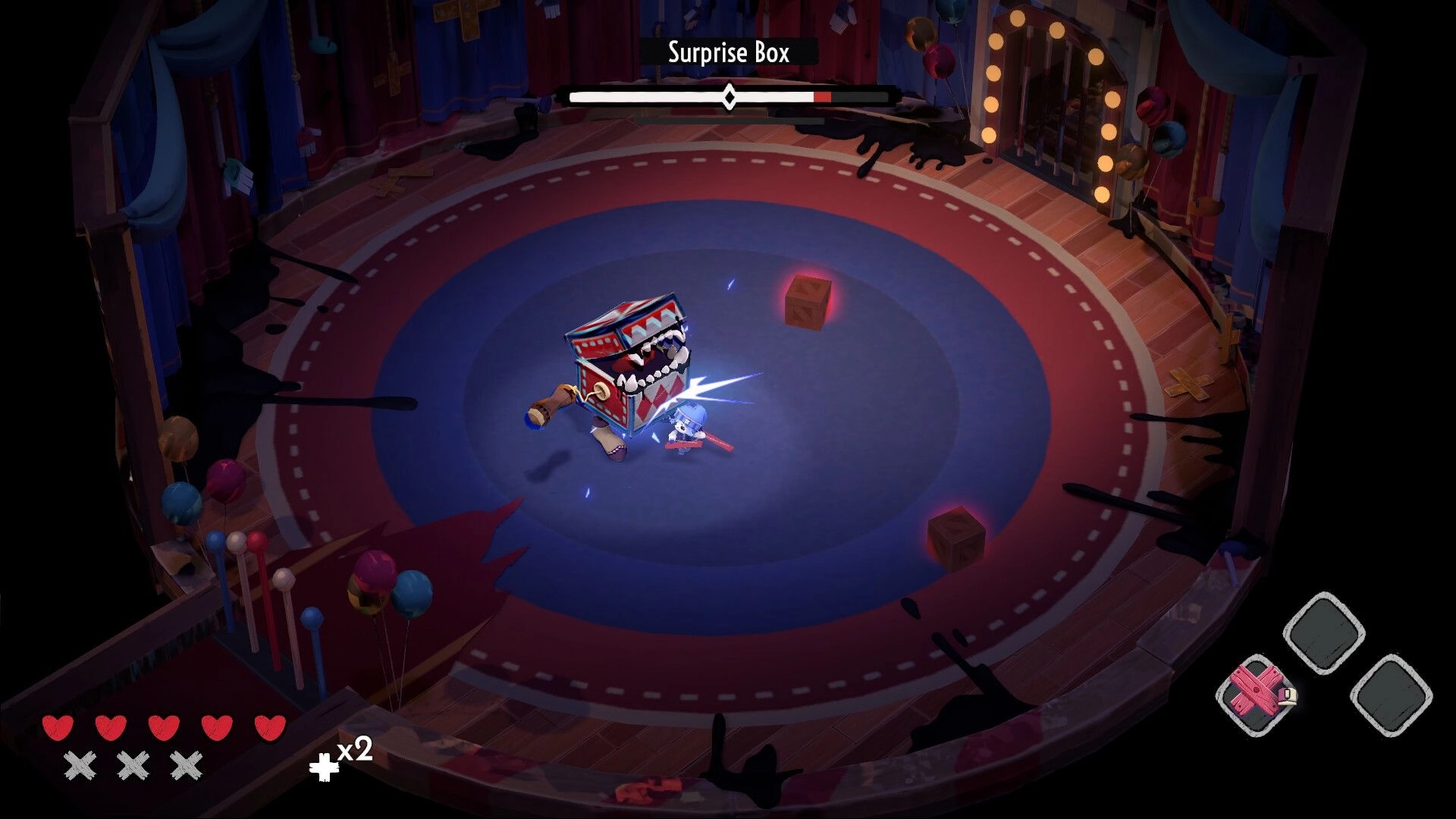 Nightmare Circus: Combat with Surprise Box enemy in a circus ring, health and inventory UI visible