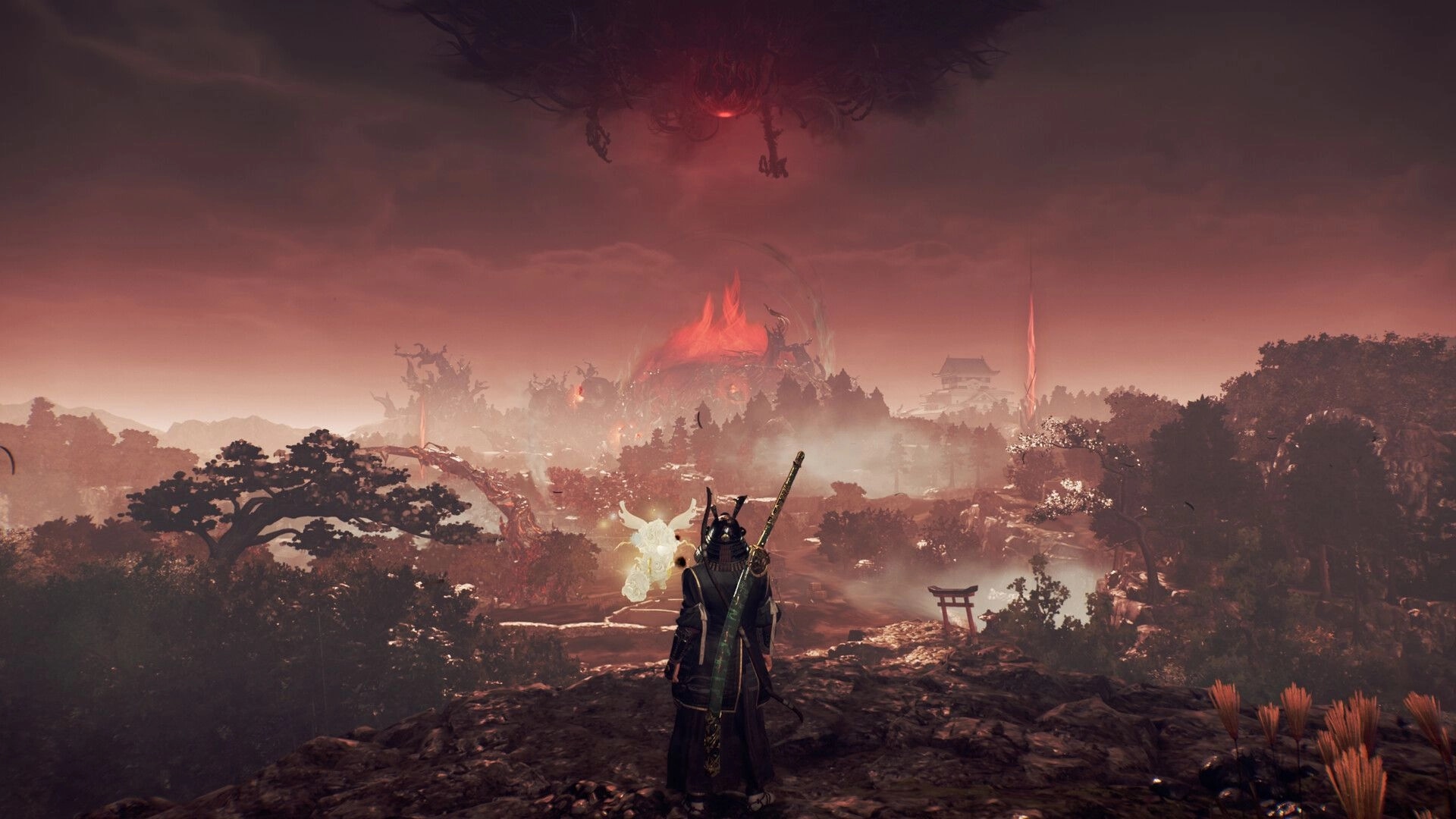 Nioh 3: Samurai observes ominous red sky and fiery mountain in a mystical, expansive terrain.