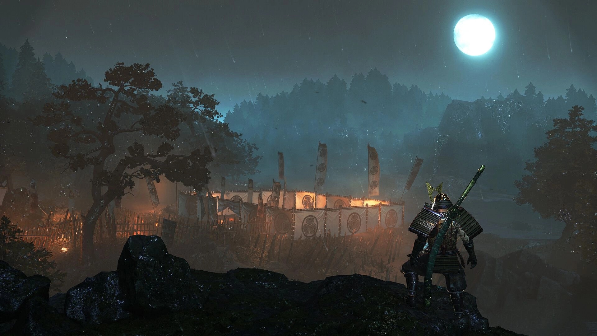 Nioh 3: Samurai overlooking a fortified camp under moonlight in a misty forest setting.