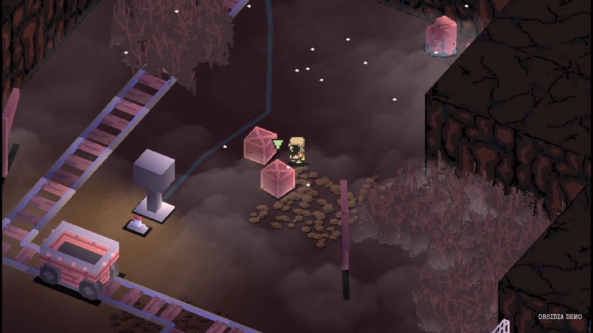 Obsidia: Player pushes glowing crates near a switch beside mine tracks in a foggy cavern corridor.