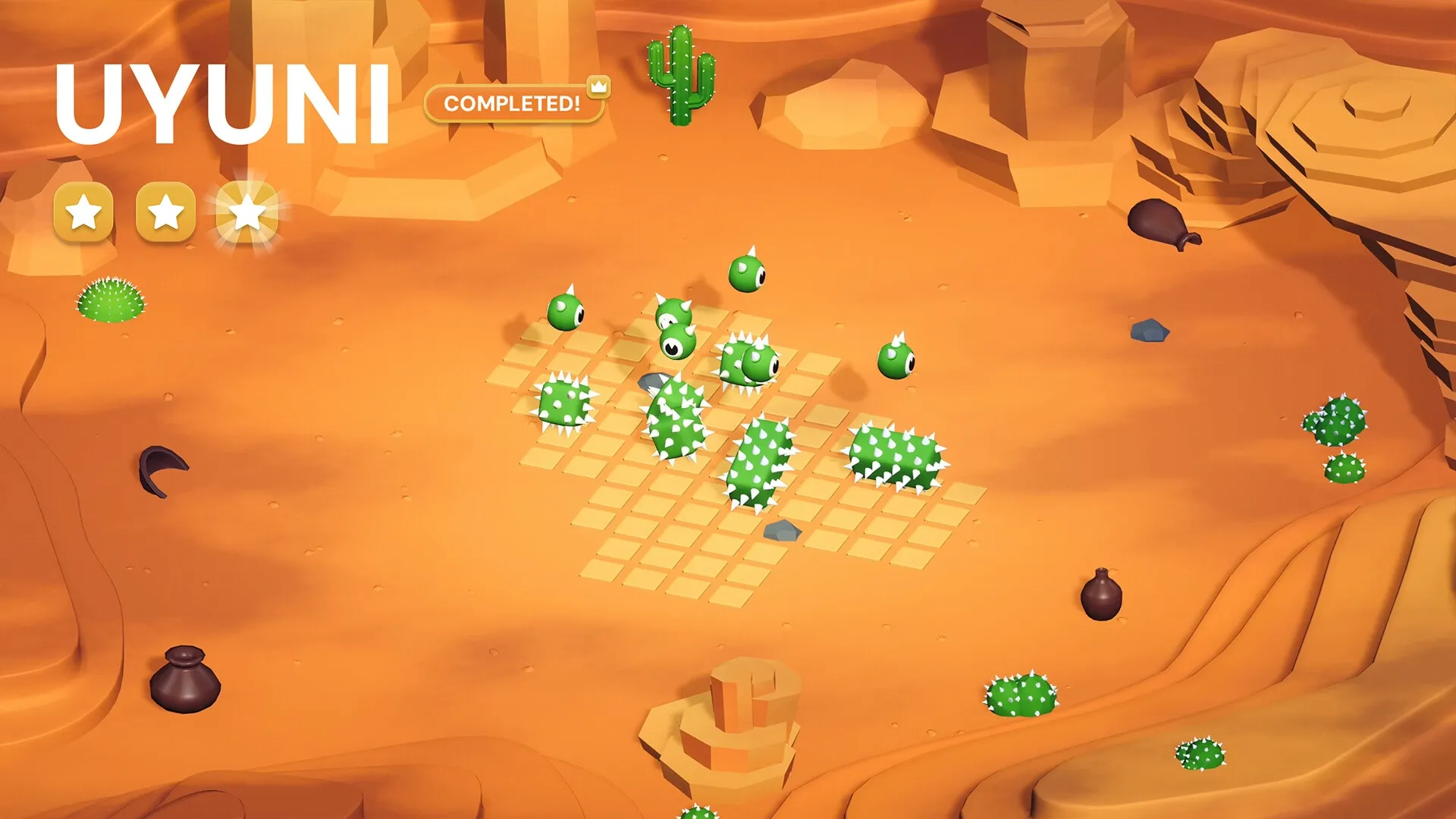 ODDLI: Green spiked creatures on desert grid with "UYUNI COMPLETED!" and three-star rating visible