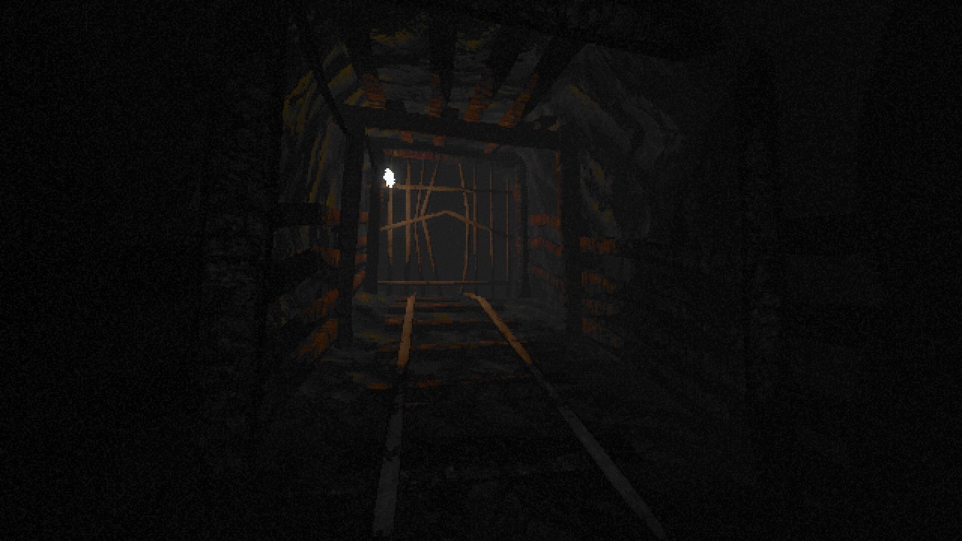 OKUREK: First-person view down mine tracks toward a boarded gate in a dark rocky tunnel ahead.