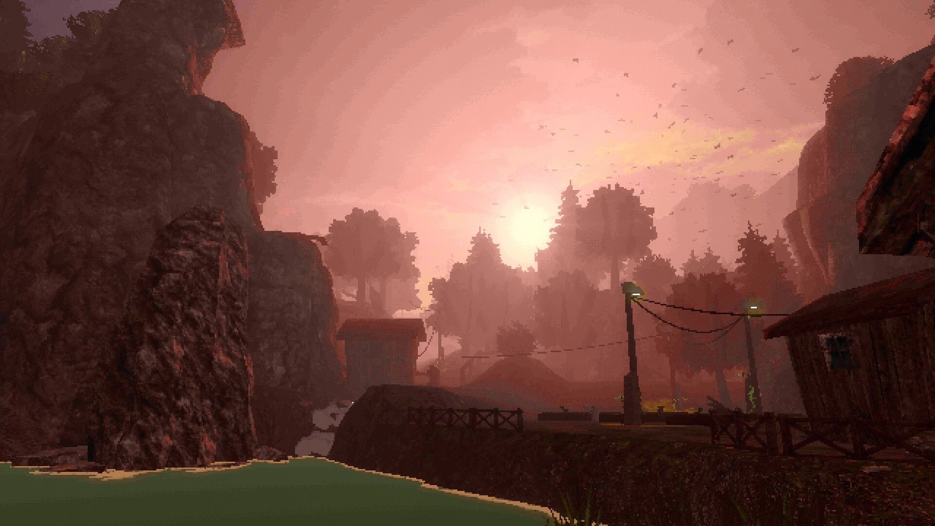 OKUREK: Foggy village path with power lines and lamps beside water at sunset in rocky valley.