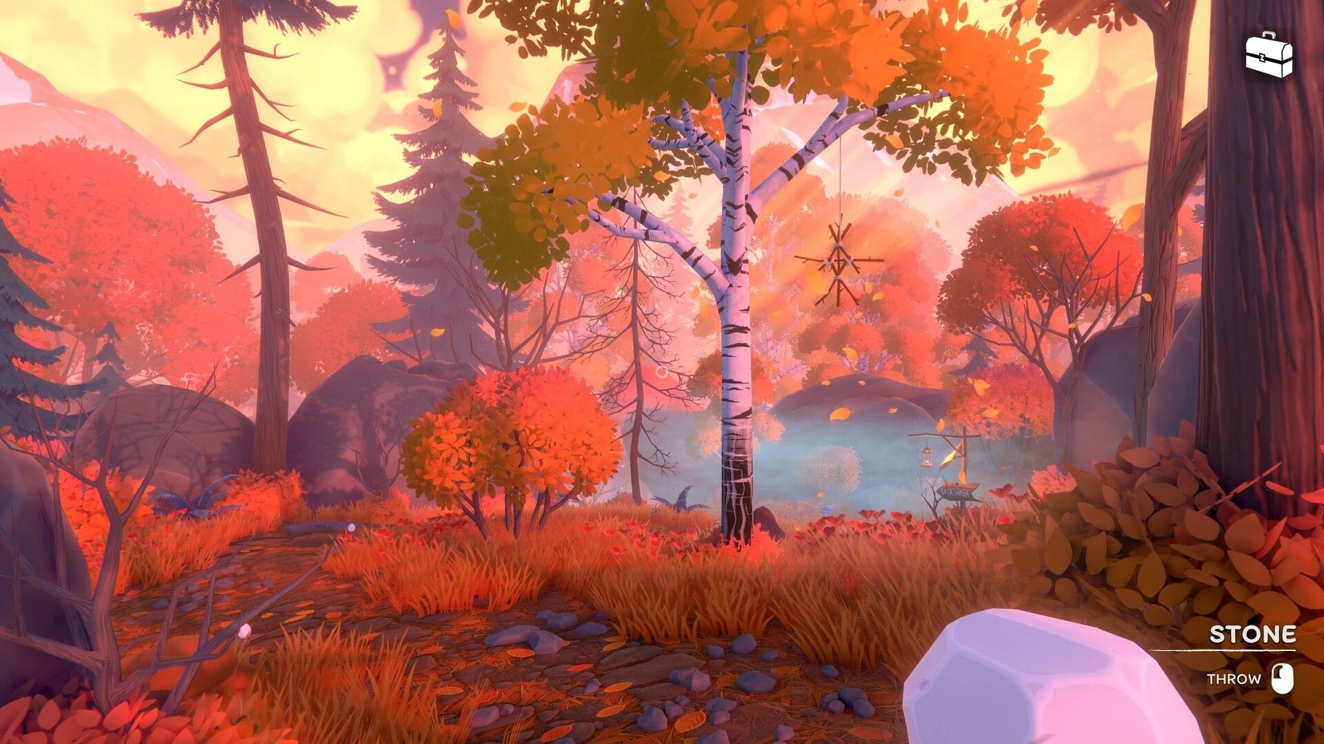 Olga: Holding a stone with throw prompt on a forest path amid orange autumn trees and mist.