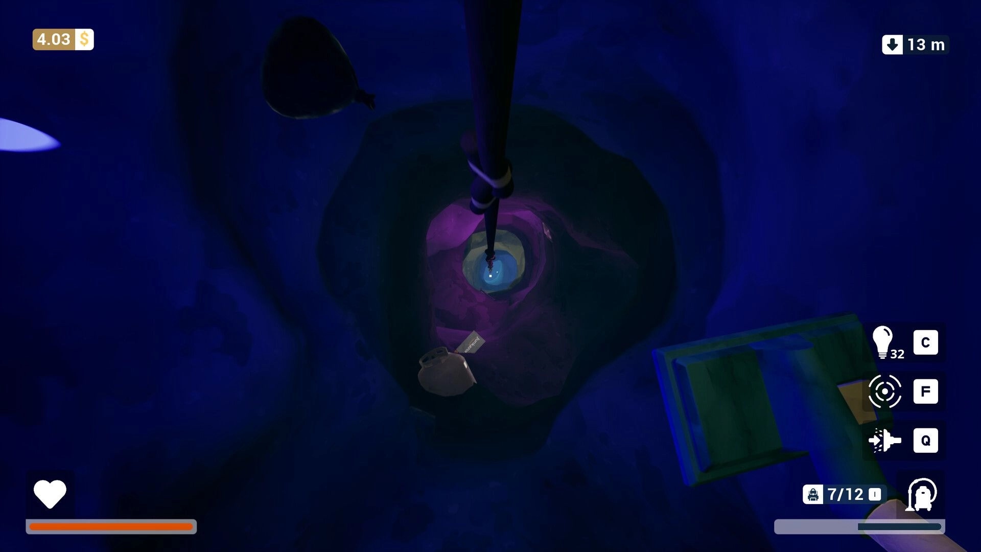 One Man´s Trash: Vacuuming items in a deep pit with UI elements showing controls and health bar