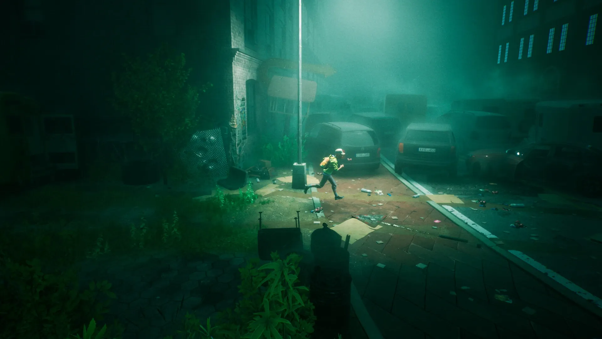 ONE WAY HOME: Boy running through foggy, abandoned street filled with cars and debris at night.