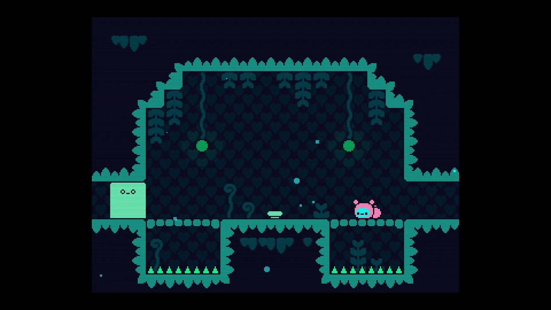 Öoo: Bomb Caterpillar navigates a dark cave with green vines, spikes, and a friendly green block face.