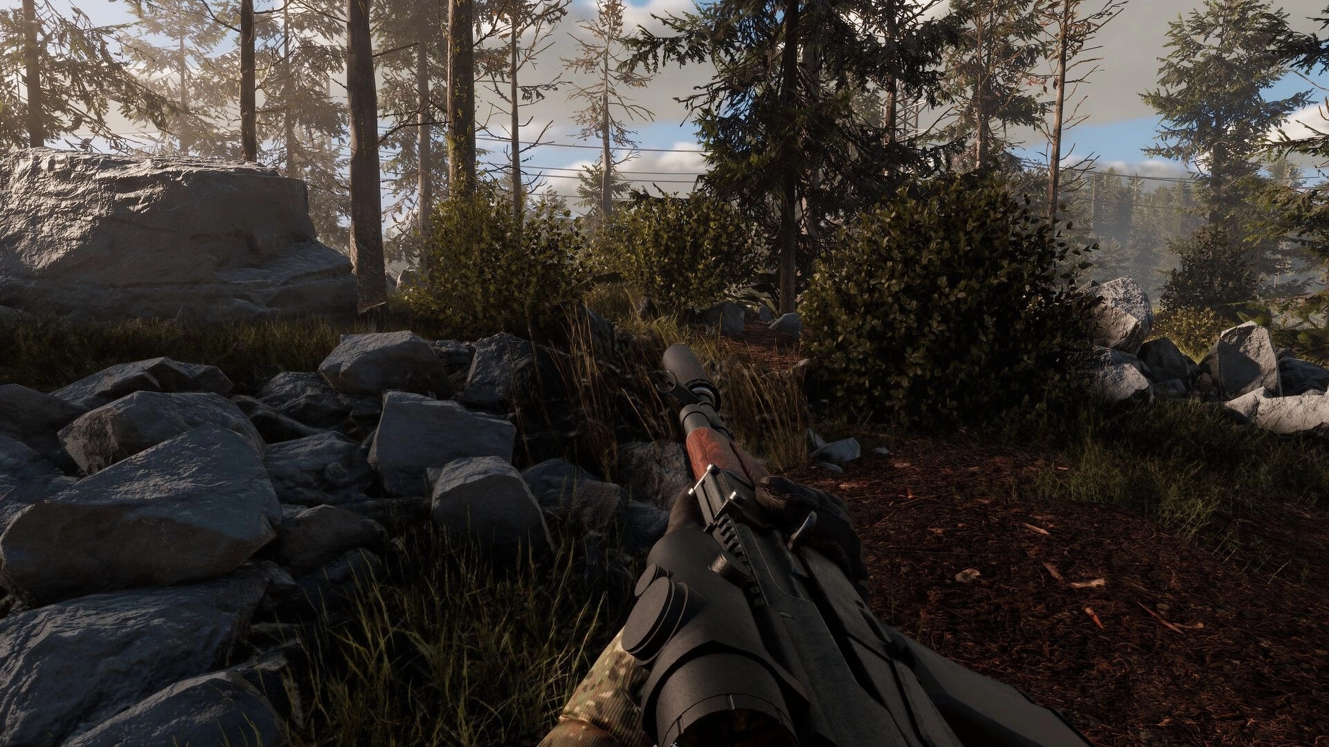 ORMOD: First-person view aiming a scoped rifle along a rocky path in a pine forest clearing.