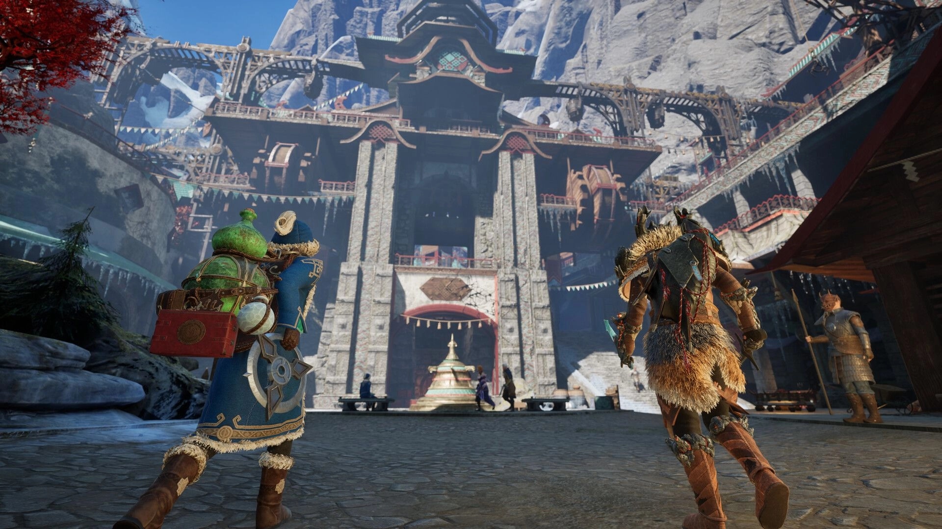 Outward 2: Two adventurers approach a grand fortress in a mountainous, snowy village setting.