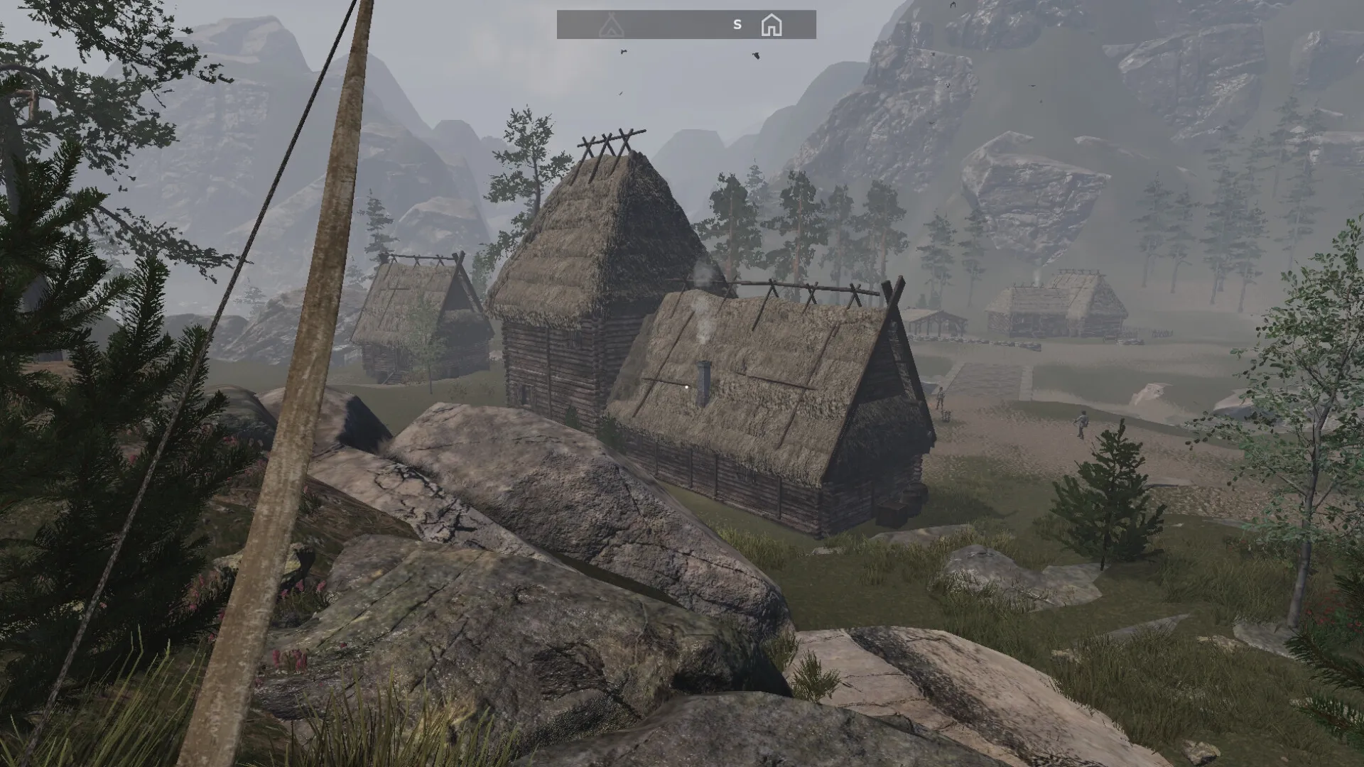 Outwith: Overlooking a medieval village with thatched-roof houses and distant mountains in the misty landscape.