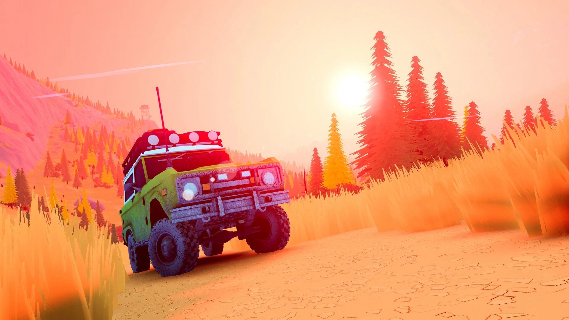 over the hill: off-road SUV climbs a dusty trail at sunset in a pine forested mountain valley.