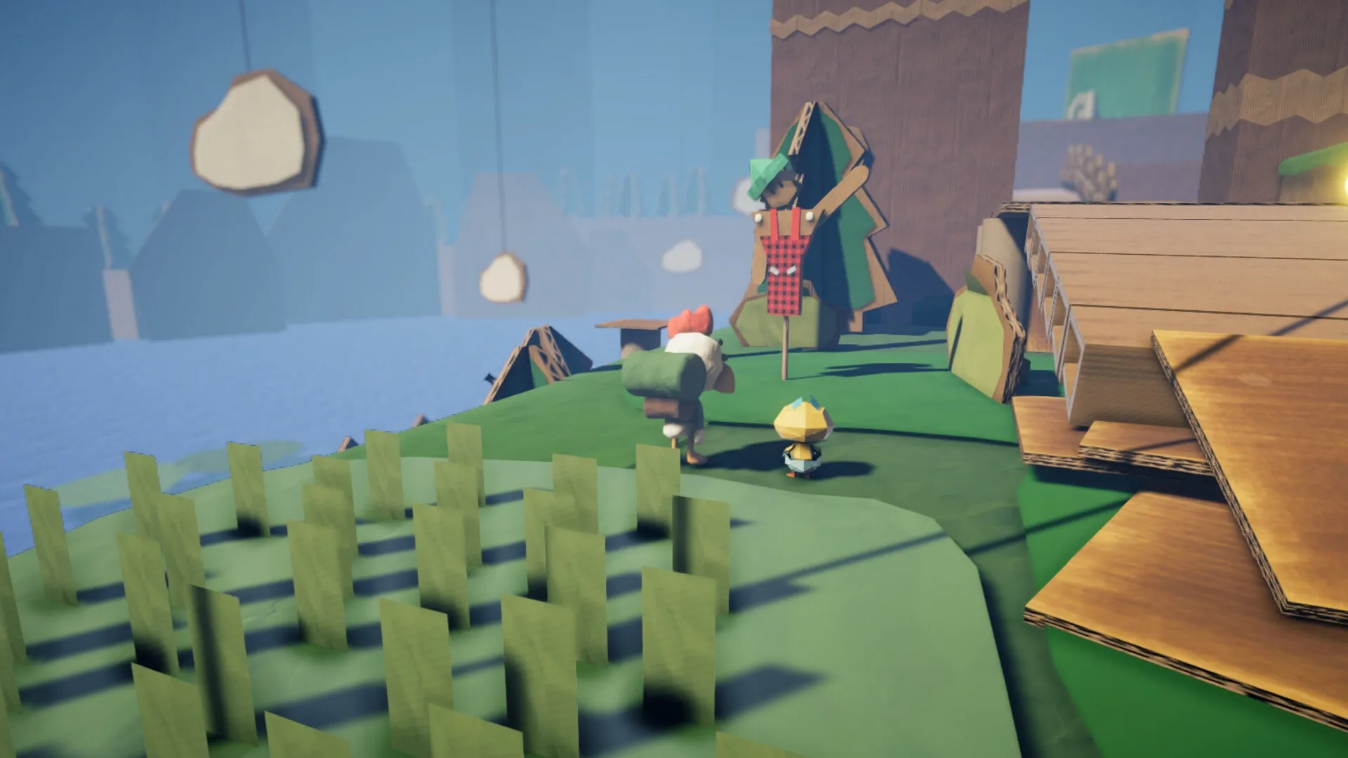 PaperKlay: Two characters exploring a cardboard forest near a wooden scarecrow by a shimmering lake