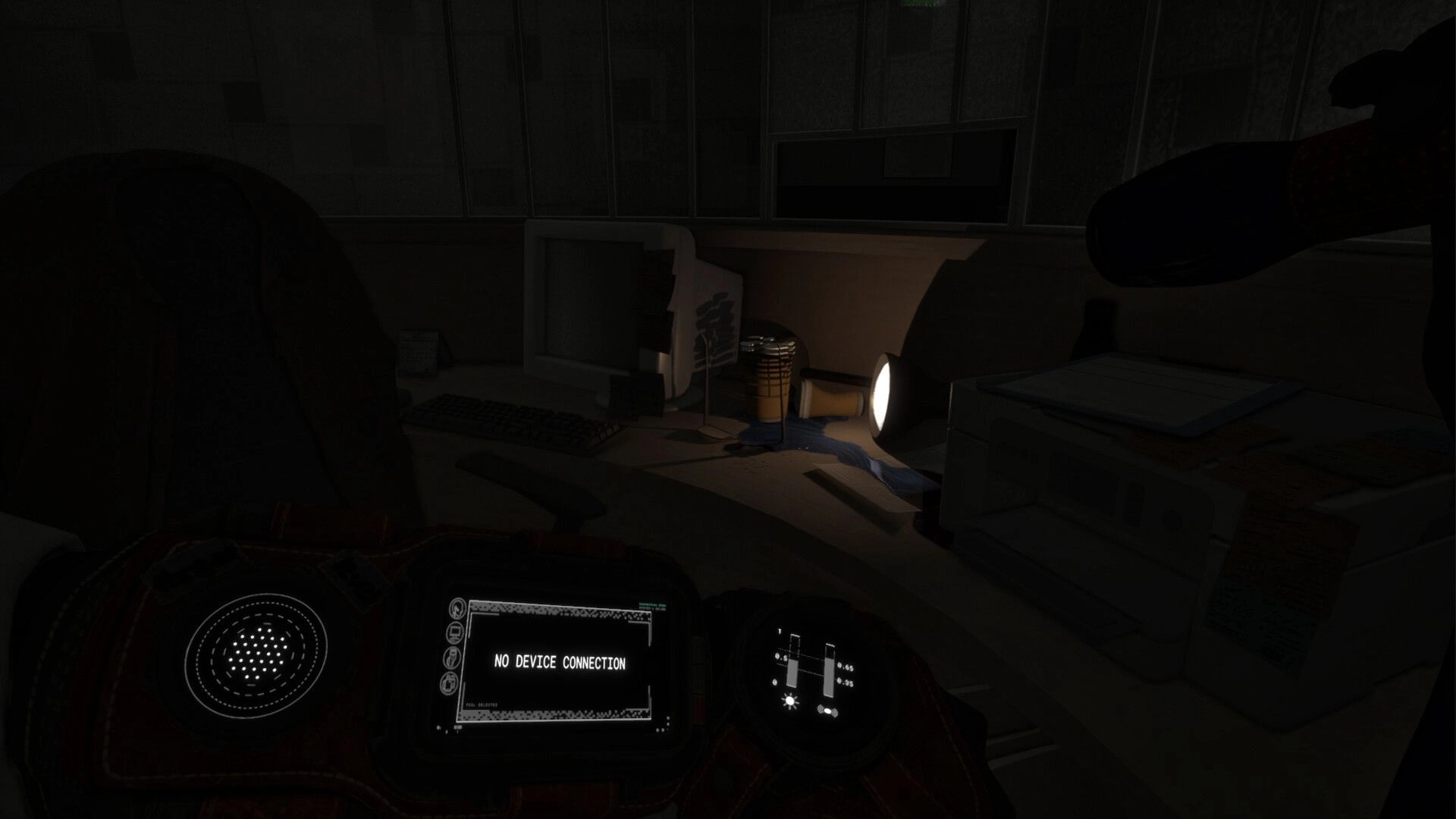 Paraxima: Wrist device reads NO DEVICE CONNECTION in a dark office with desk, monitor and flashlight.