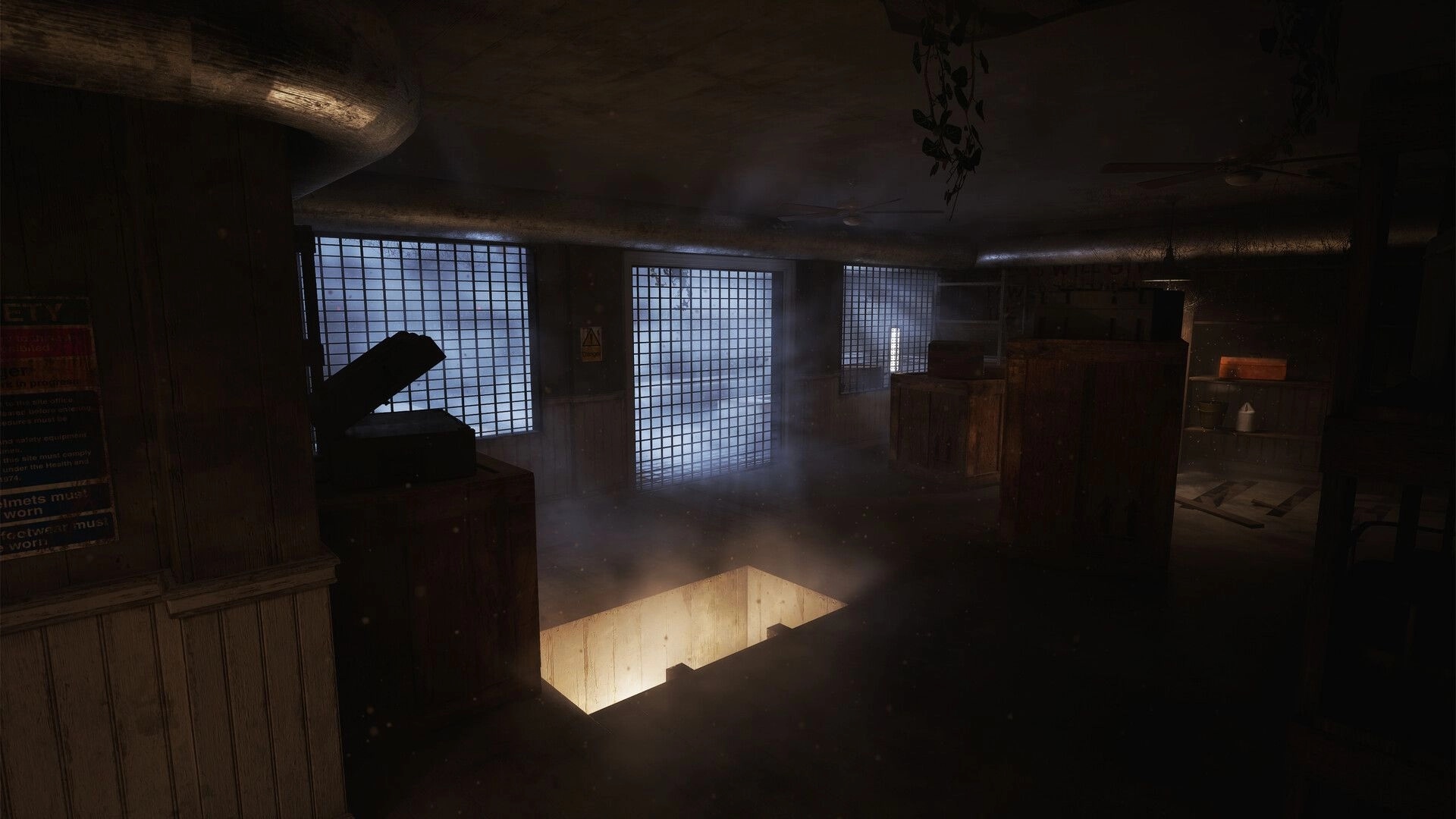 Paresis® II: Dusty attic hallway with barred windows, crates, and a glowing stairwell opening below.