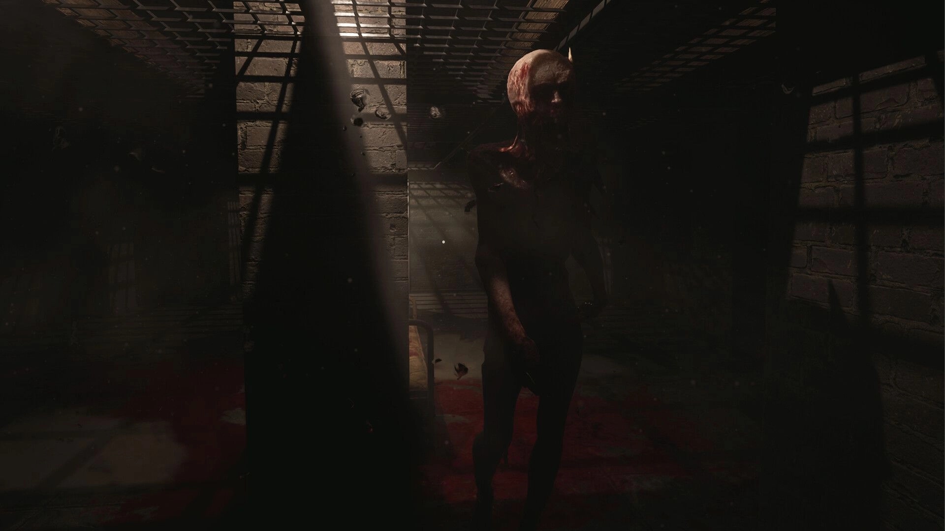 Paresis® II: Bloodied humanoid morph stands in a dim brick cell under a grated ceiling light beam.