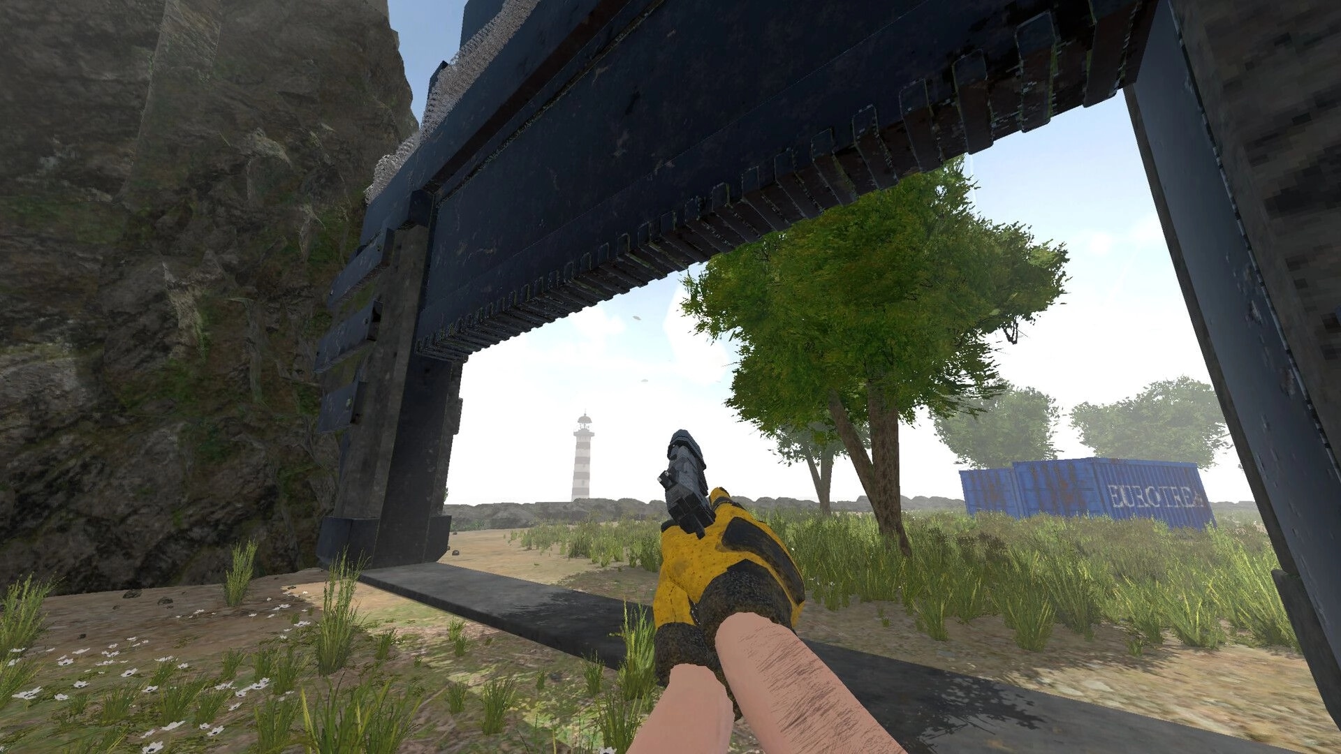Partizan: Player aiming pistol under a metal archway in grassy field with distant lighthouse view