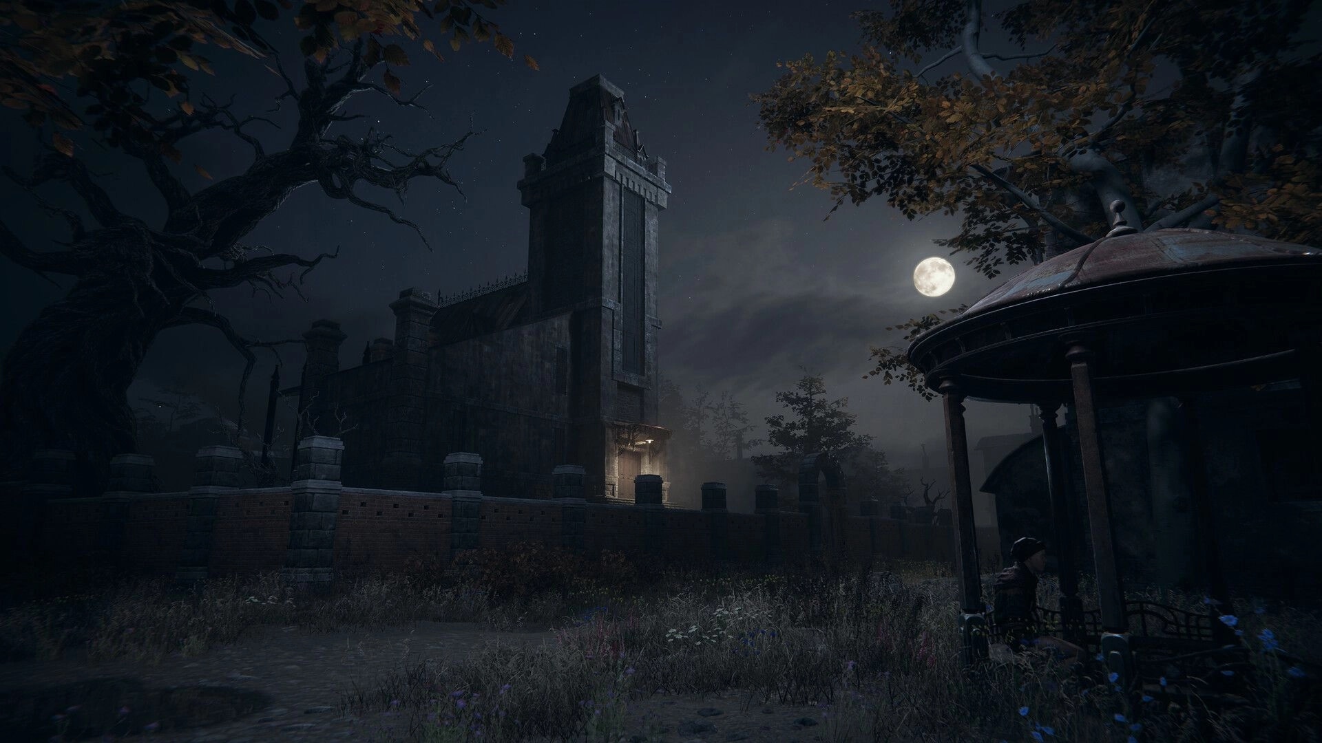 Pathologic 3: Moonlit town scene with a tall building, eerie trees, and a gazebo under a cloudy sky