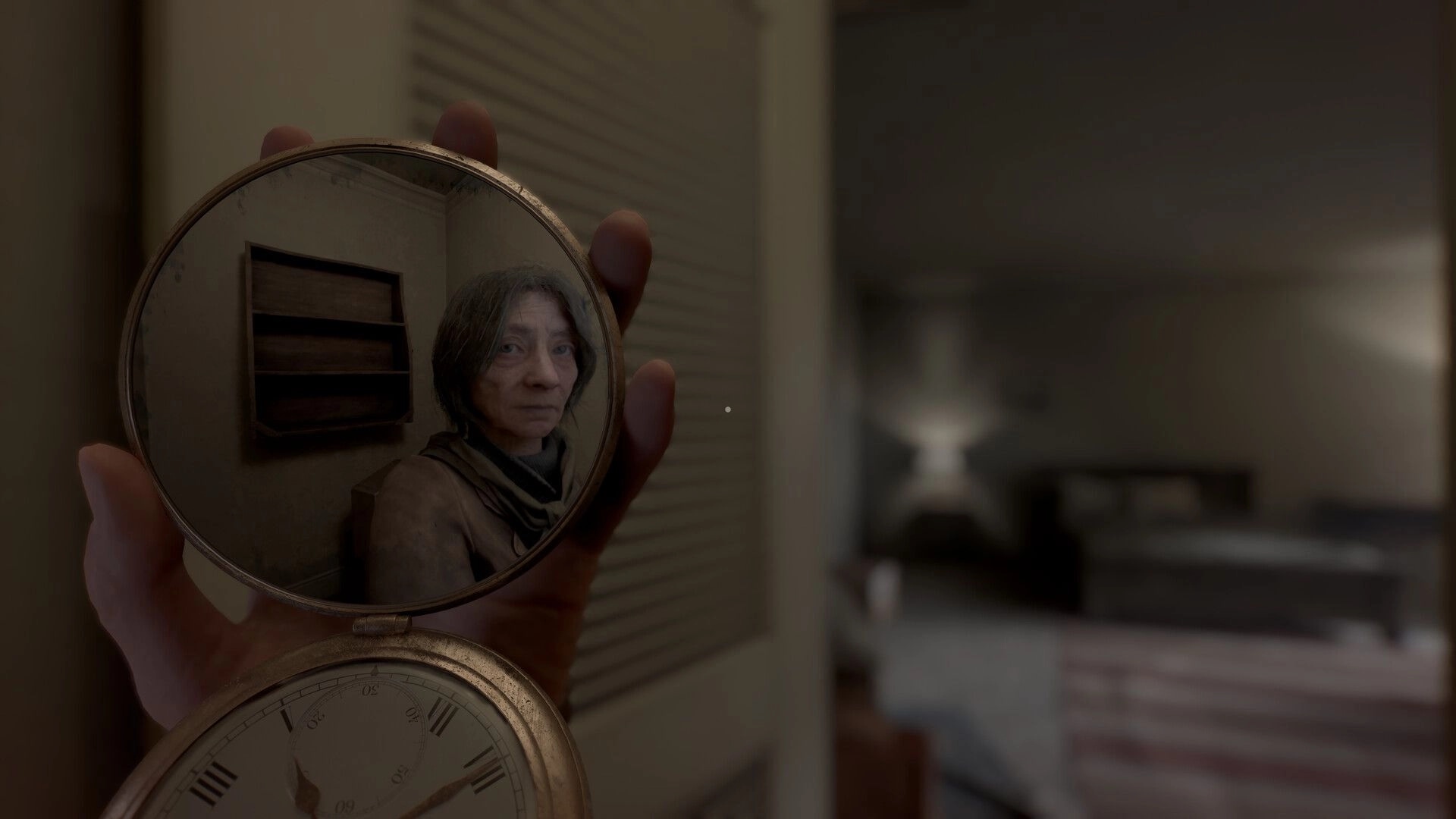 Perceptum: Holding a pocket mirror revealing an old woman’s face in a dim, blurred bedroom interior.