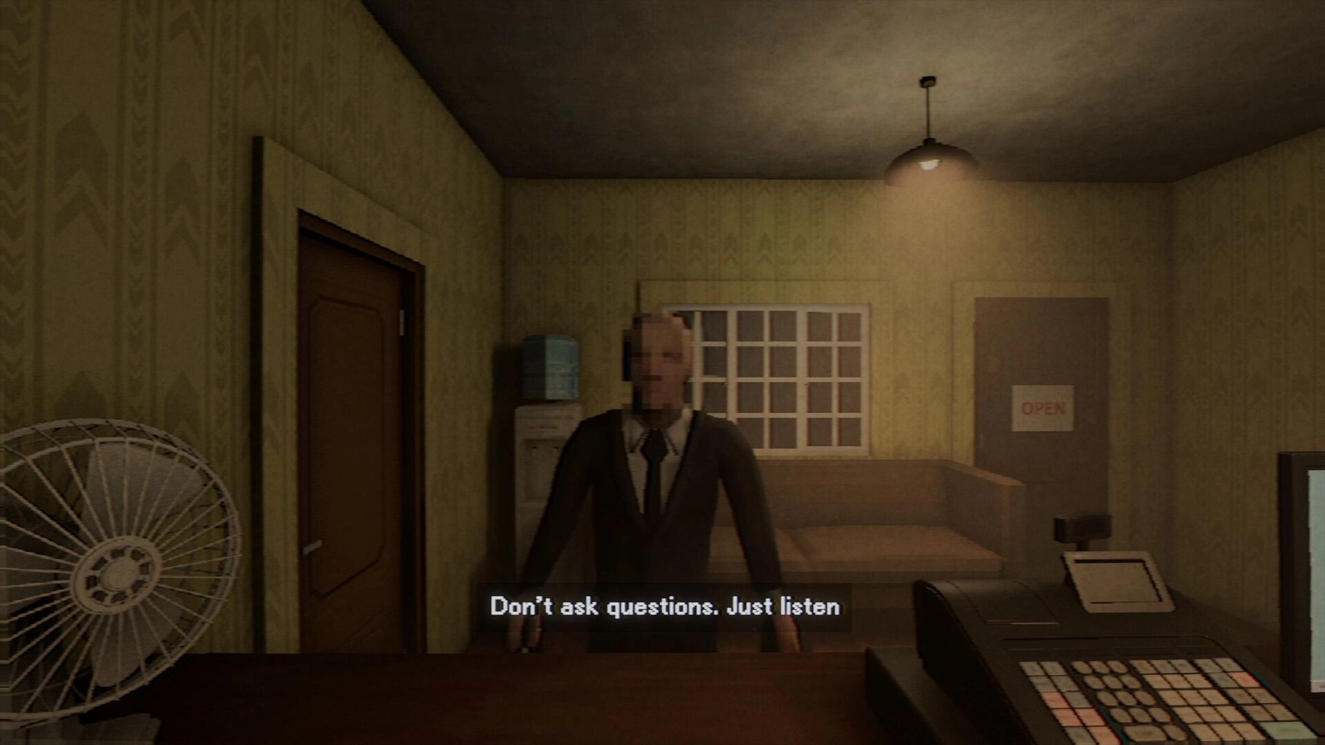 Photomaly: Suited customer at the counter with dialogue text in a dim photo studio lobby and cash register.