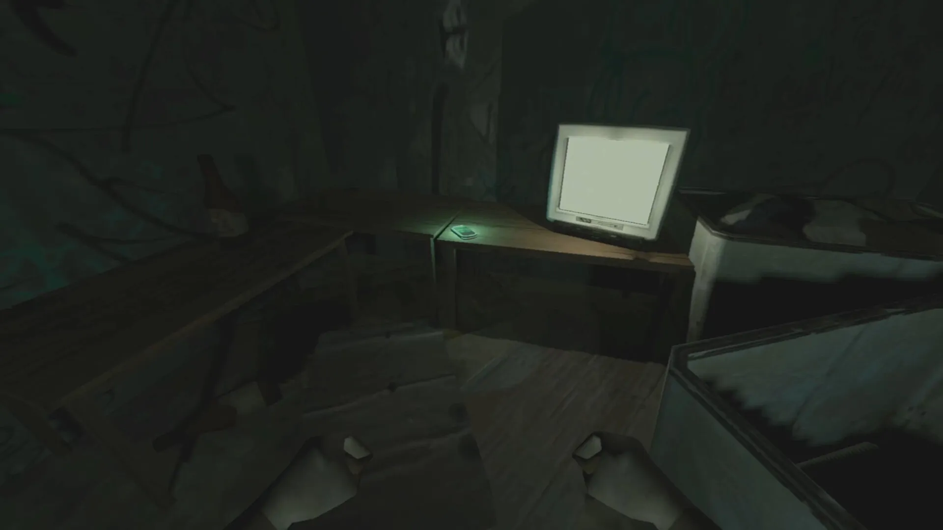 PIGFACE: First-person view in a dimly lit room with a glowing computer screen and scattered papers.
